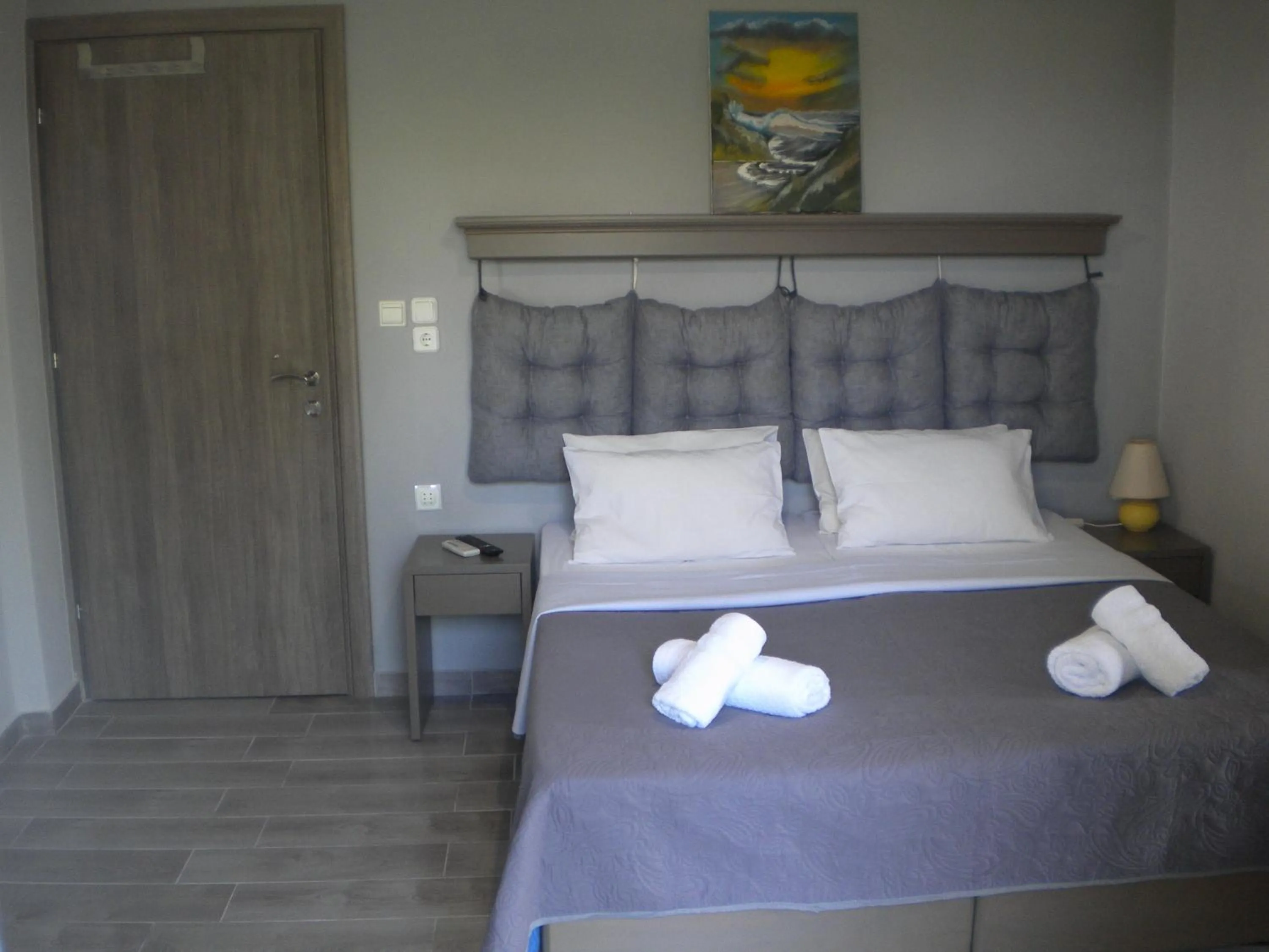 Bed in Nostos Apartments
