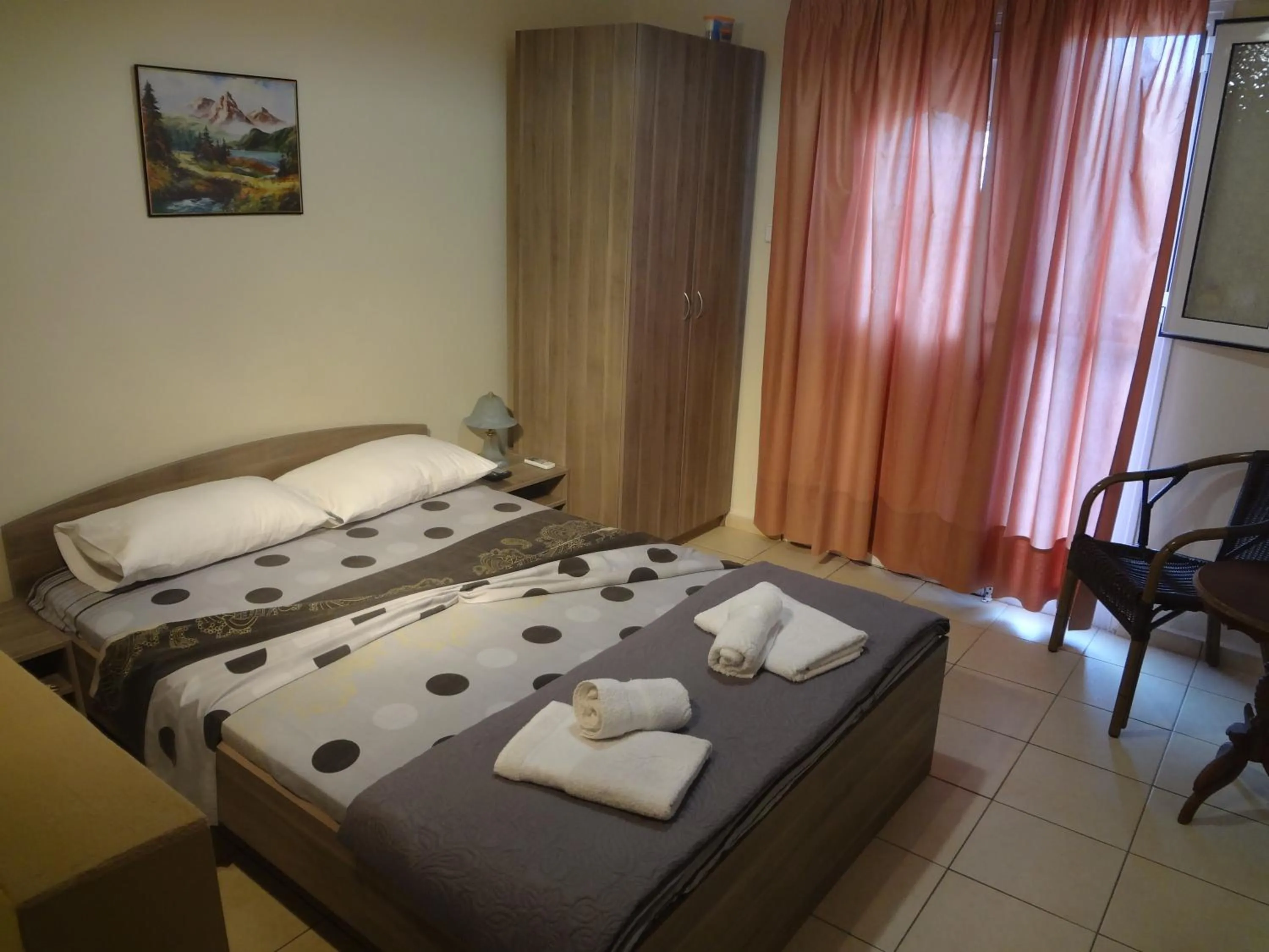 Bed in Nostos Apartments