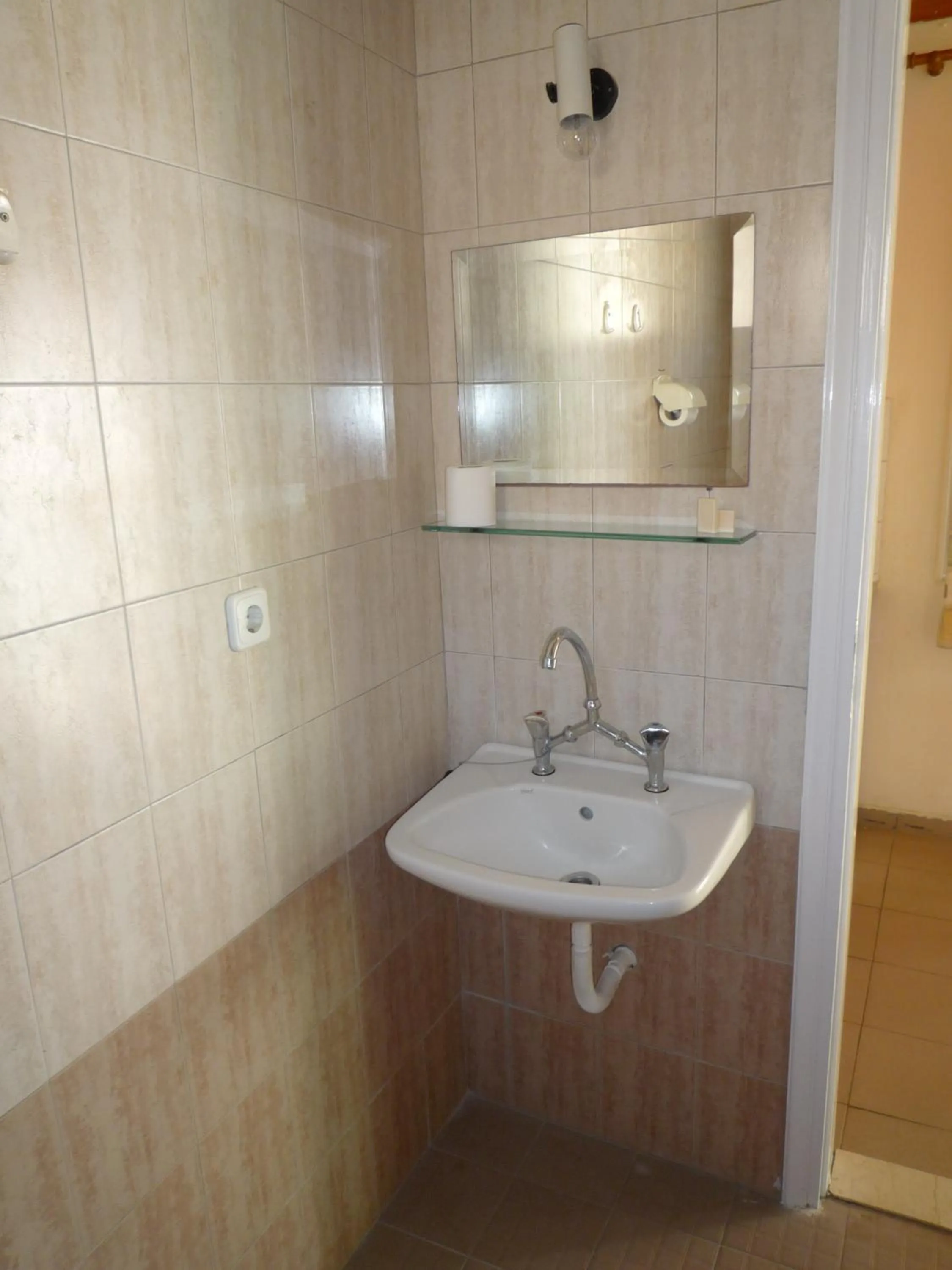 Bathroom in Haris Apartments