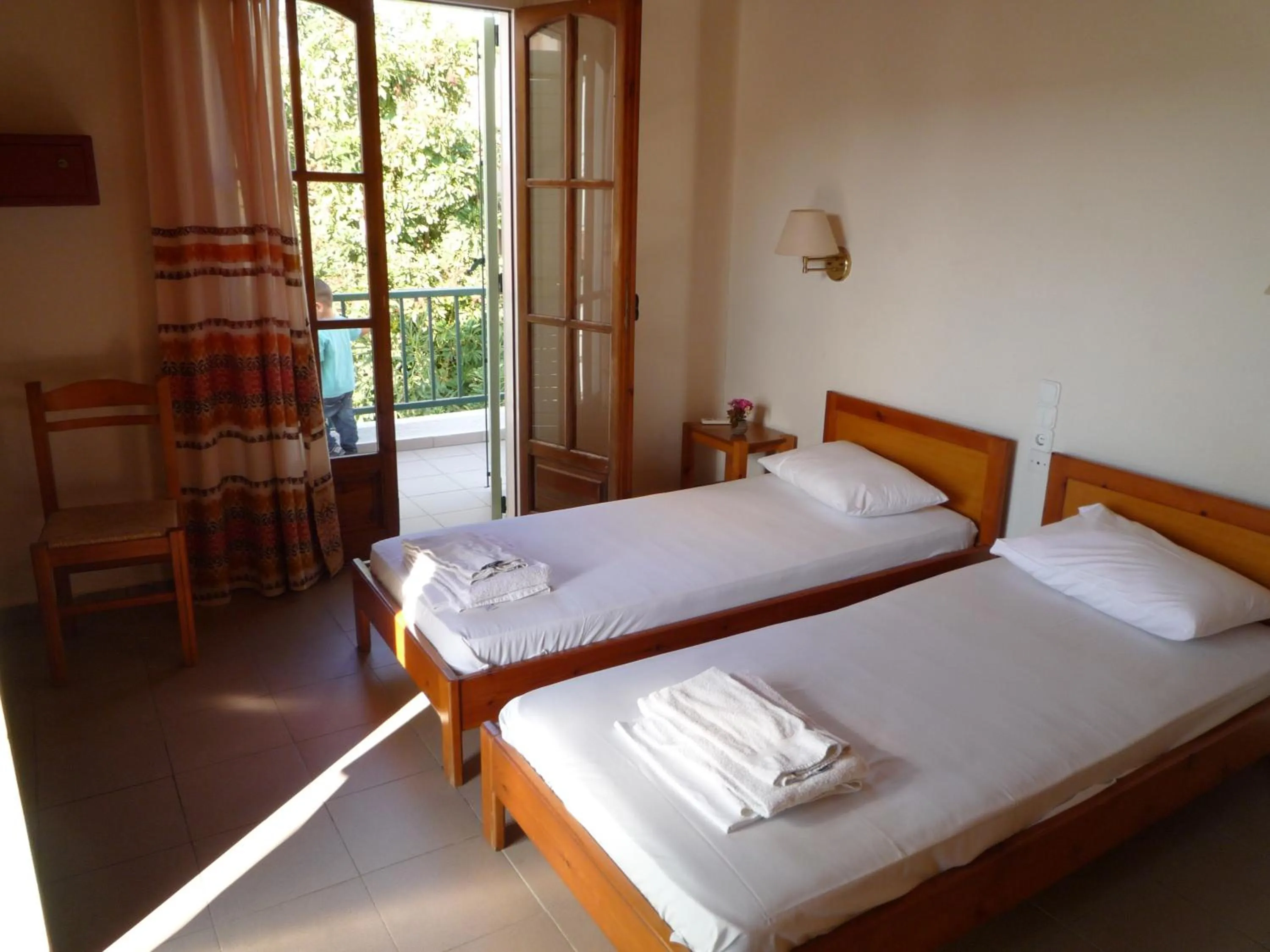 Bedroom in Haris Apartments