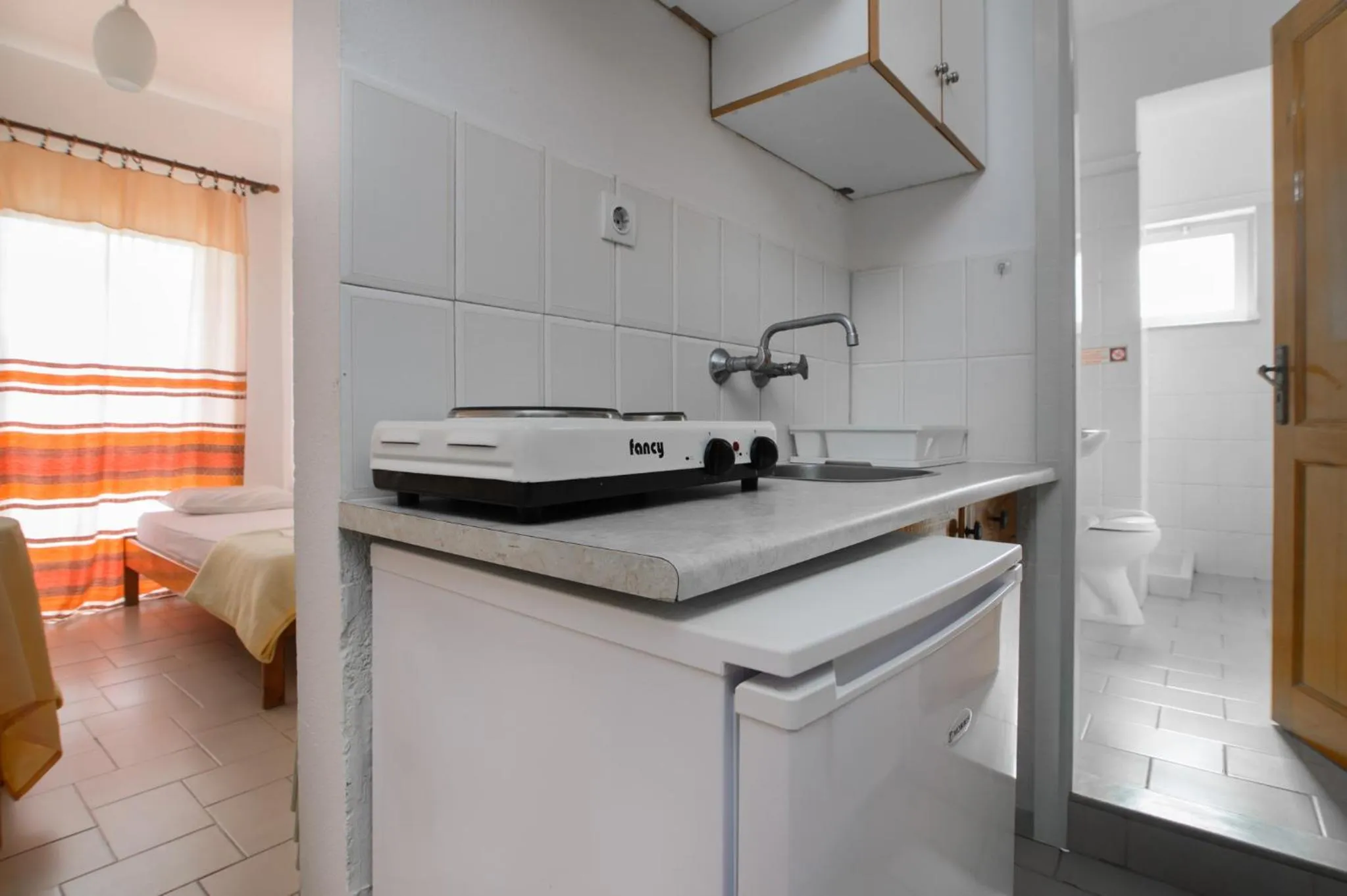 Kitchen or kitchenette in Haris Apartments