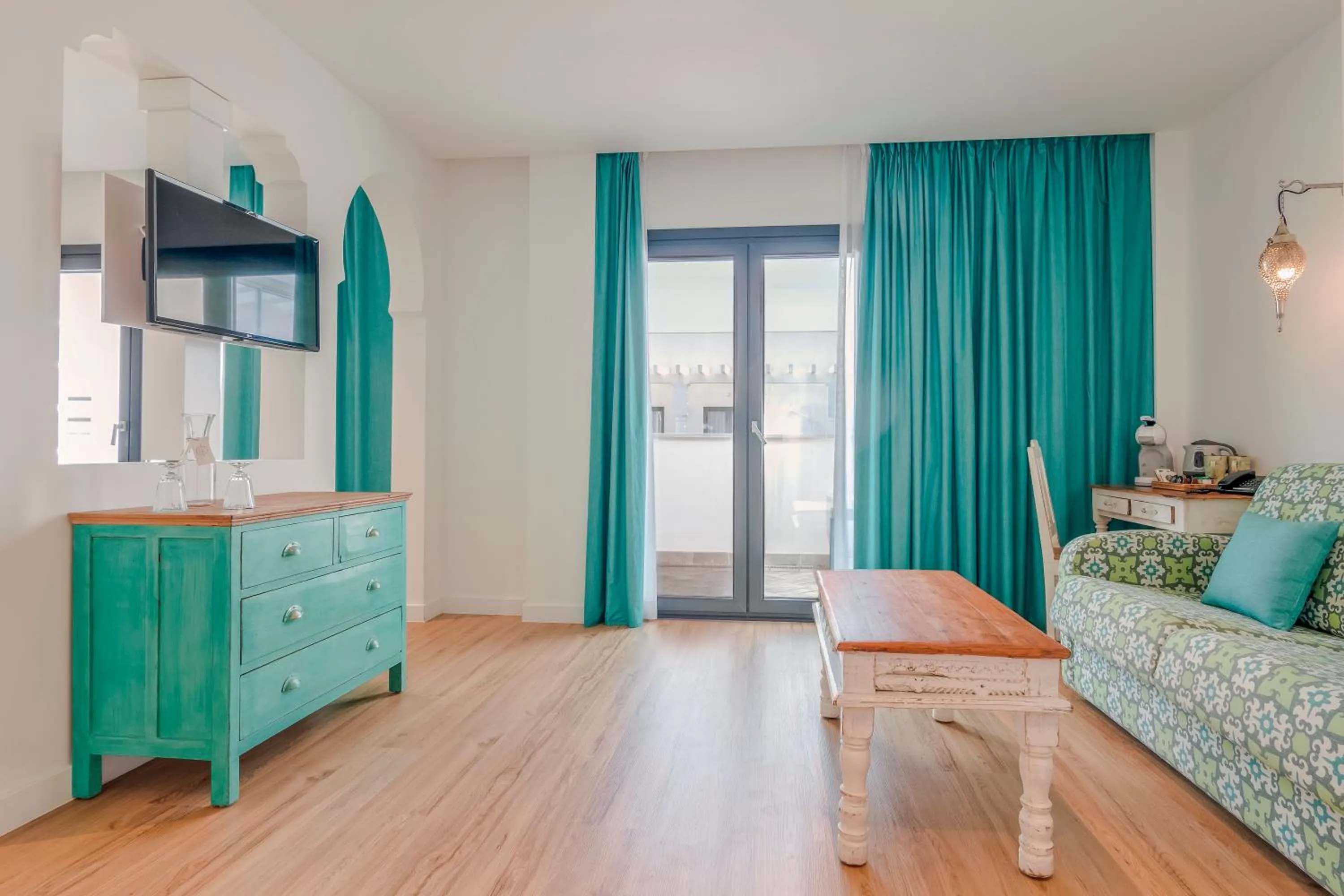 Communal lounge/ TV room, Bed in La Residencia Puerto Hotel & Spa