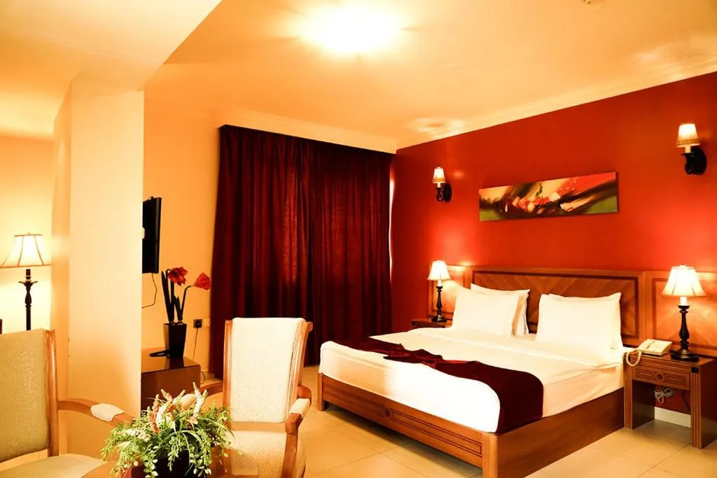 Bed in La Rosa Hotel Oman