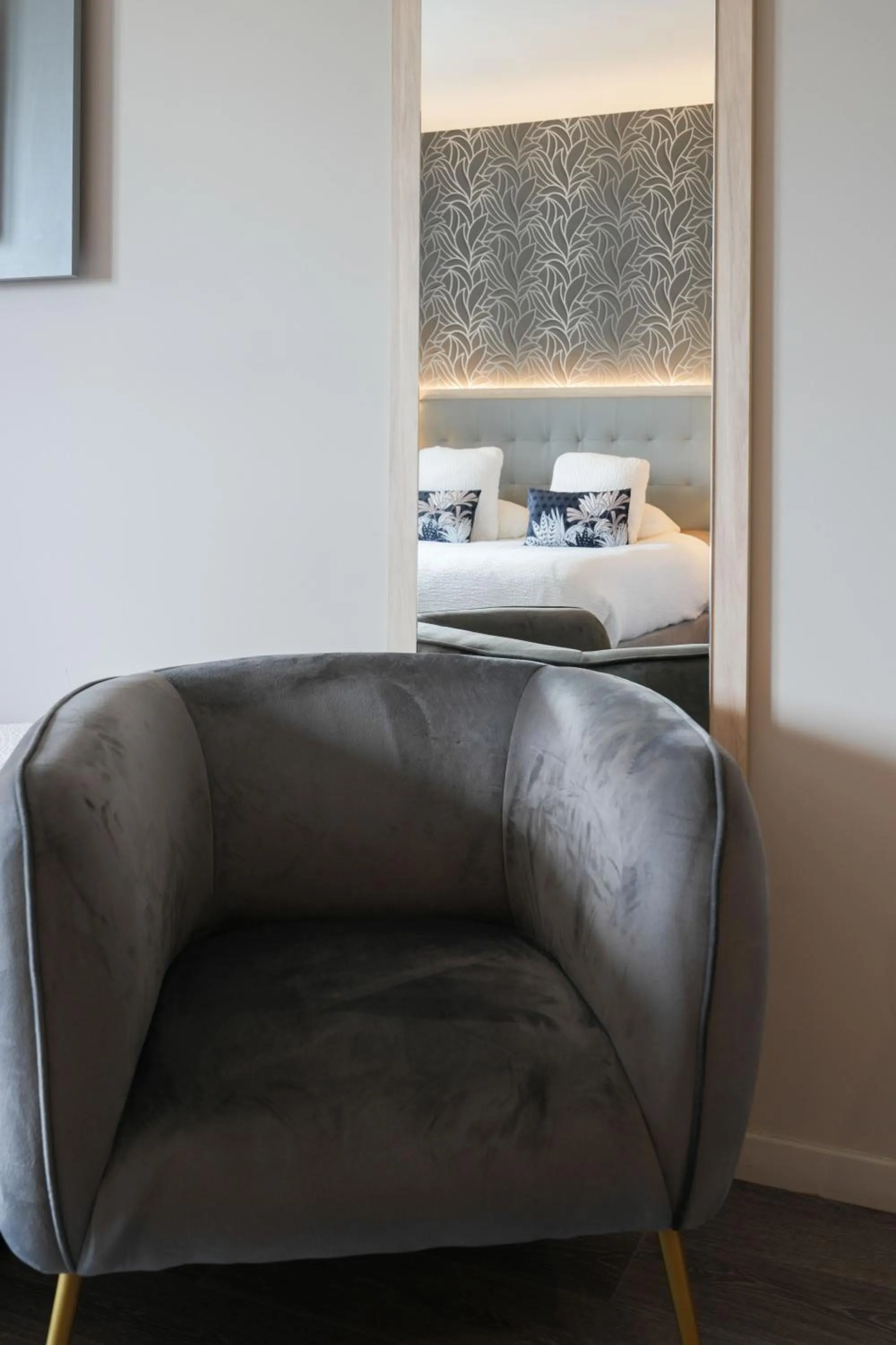 Bed in Logis Hôtel l'Amandier