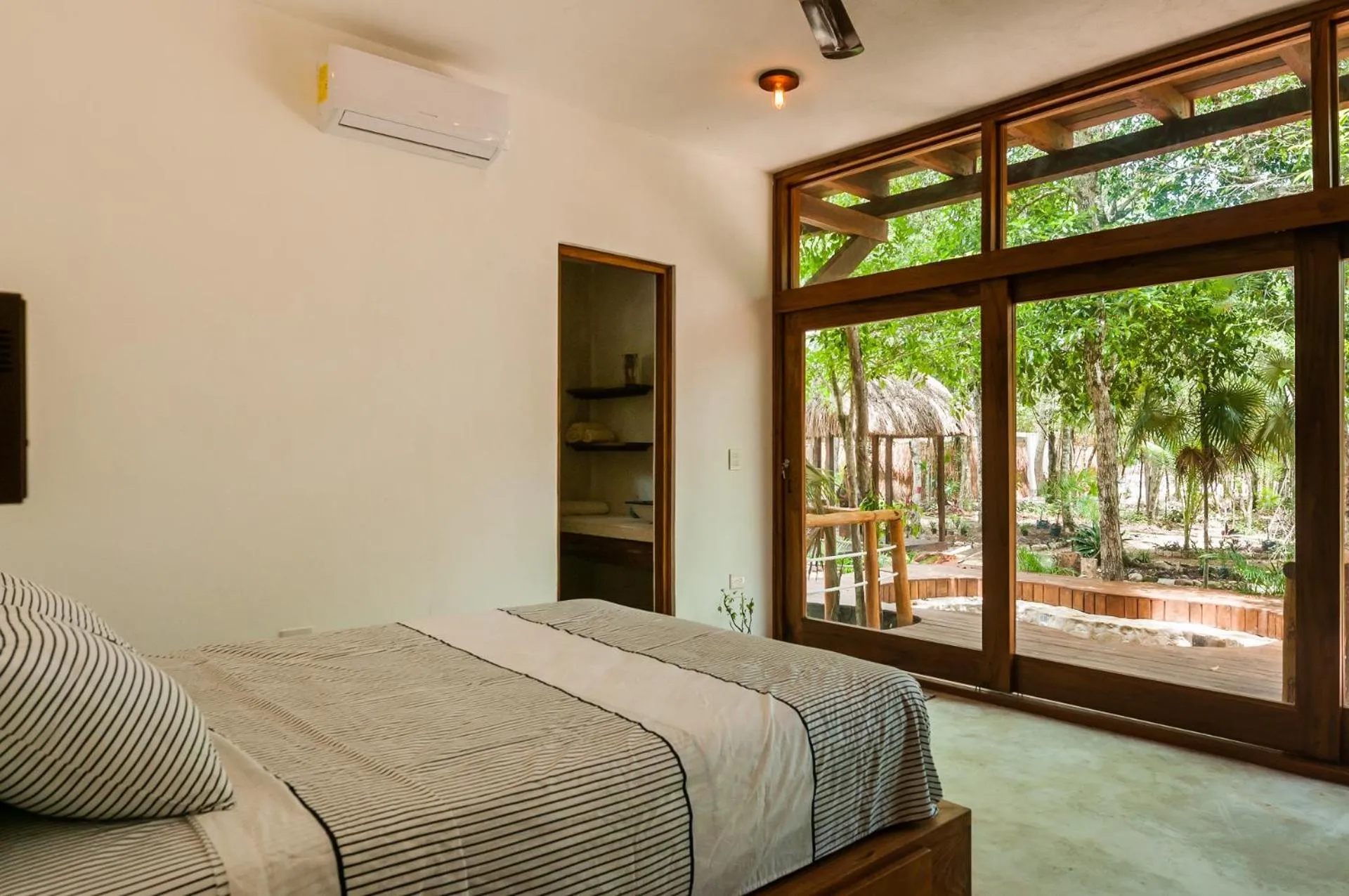 Bed in Jungle Chic Villa in Chemuyil