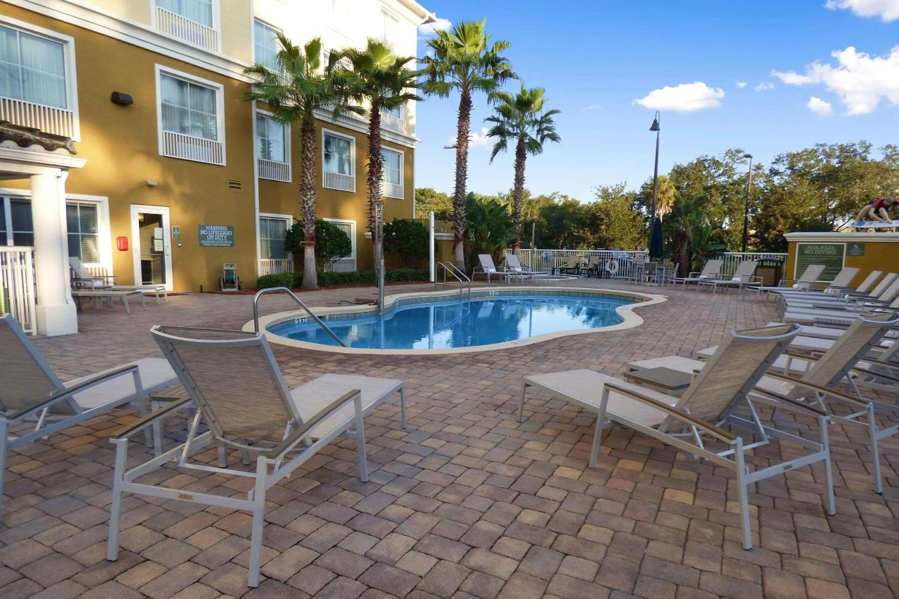 Swimming pool in Country Inn & Suites by Radisson, Port Orange-Daytona, FL