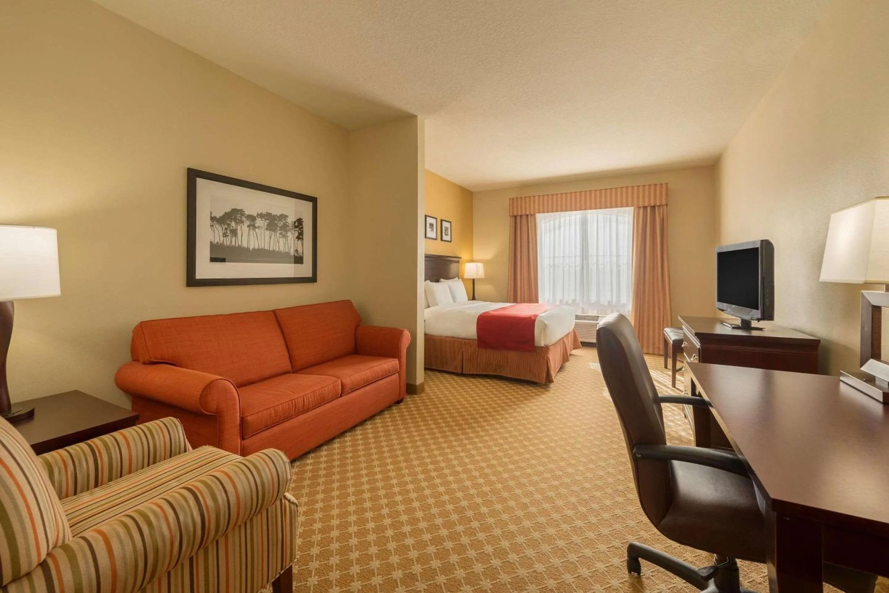 Bedroom in Country Inn & Suites by Radisson, Port Orange-Daytona, FL