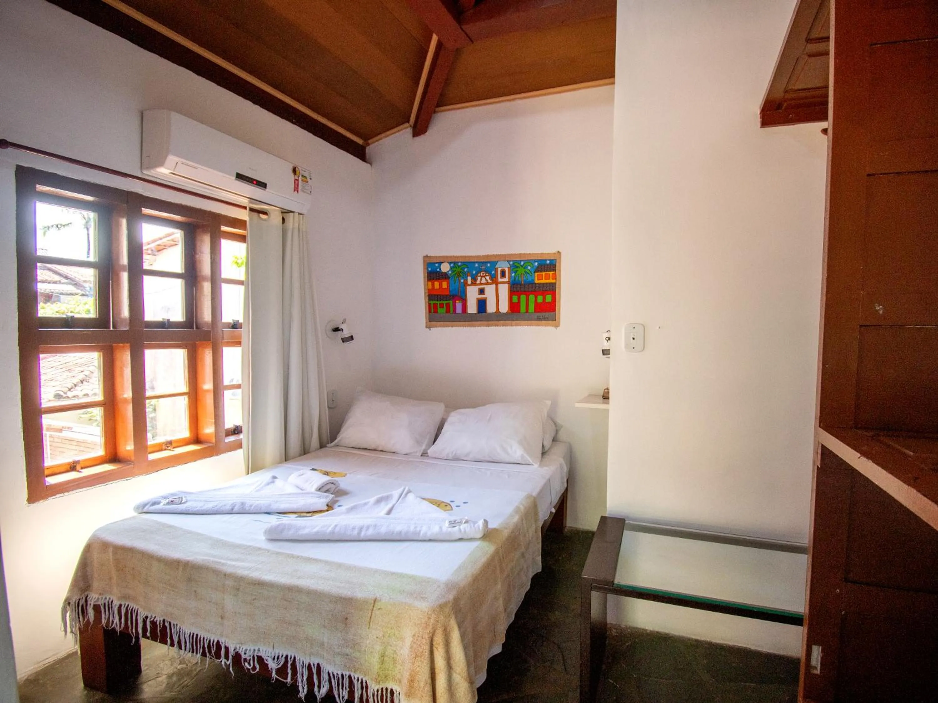 Bed in Pousada Arraial Candeia