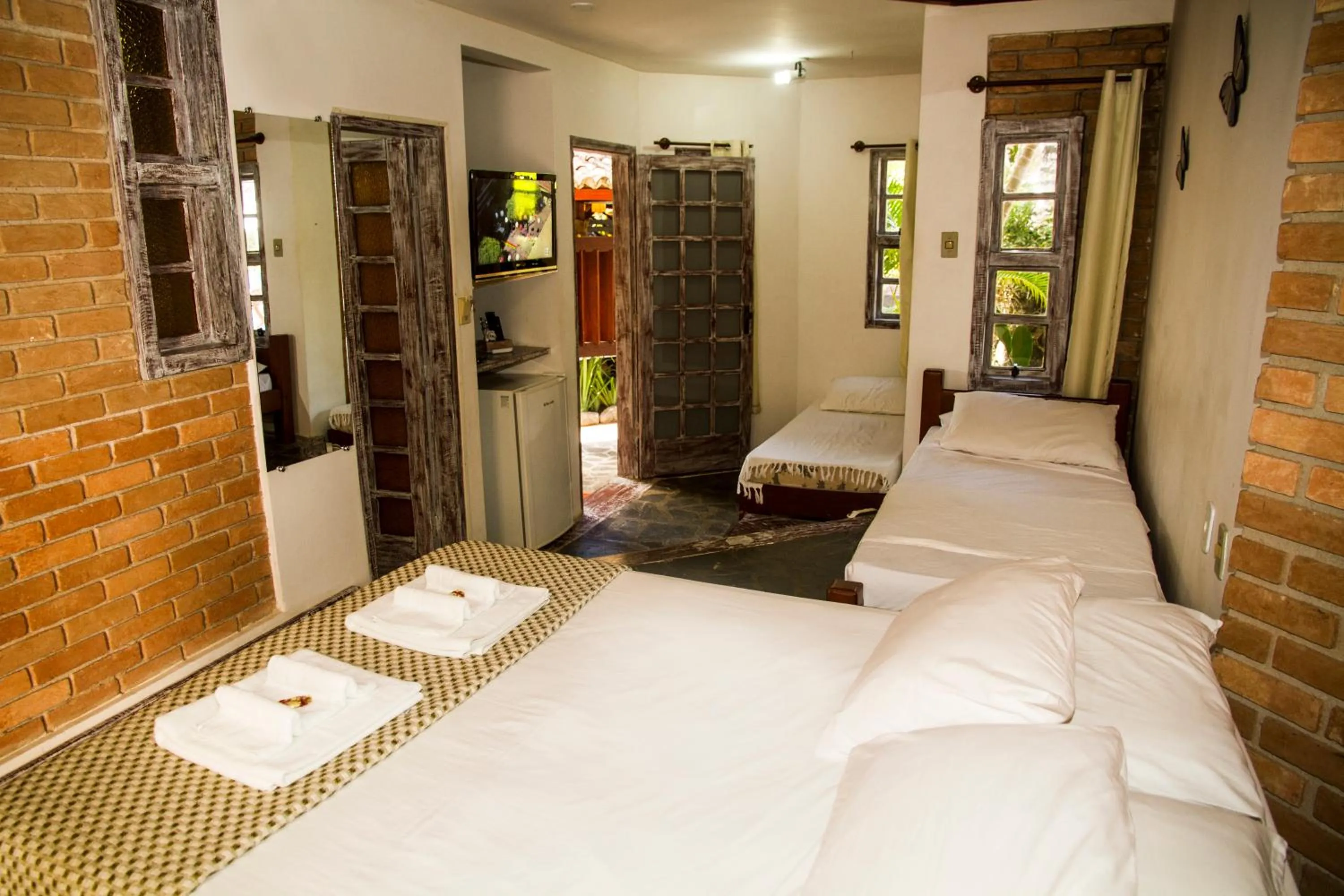 Photo of the whole room, Bed in Pousada Arraial Candeia