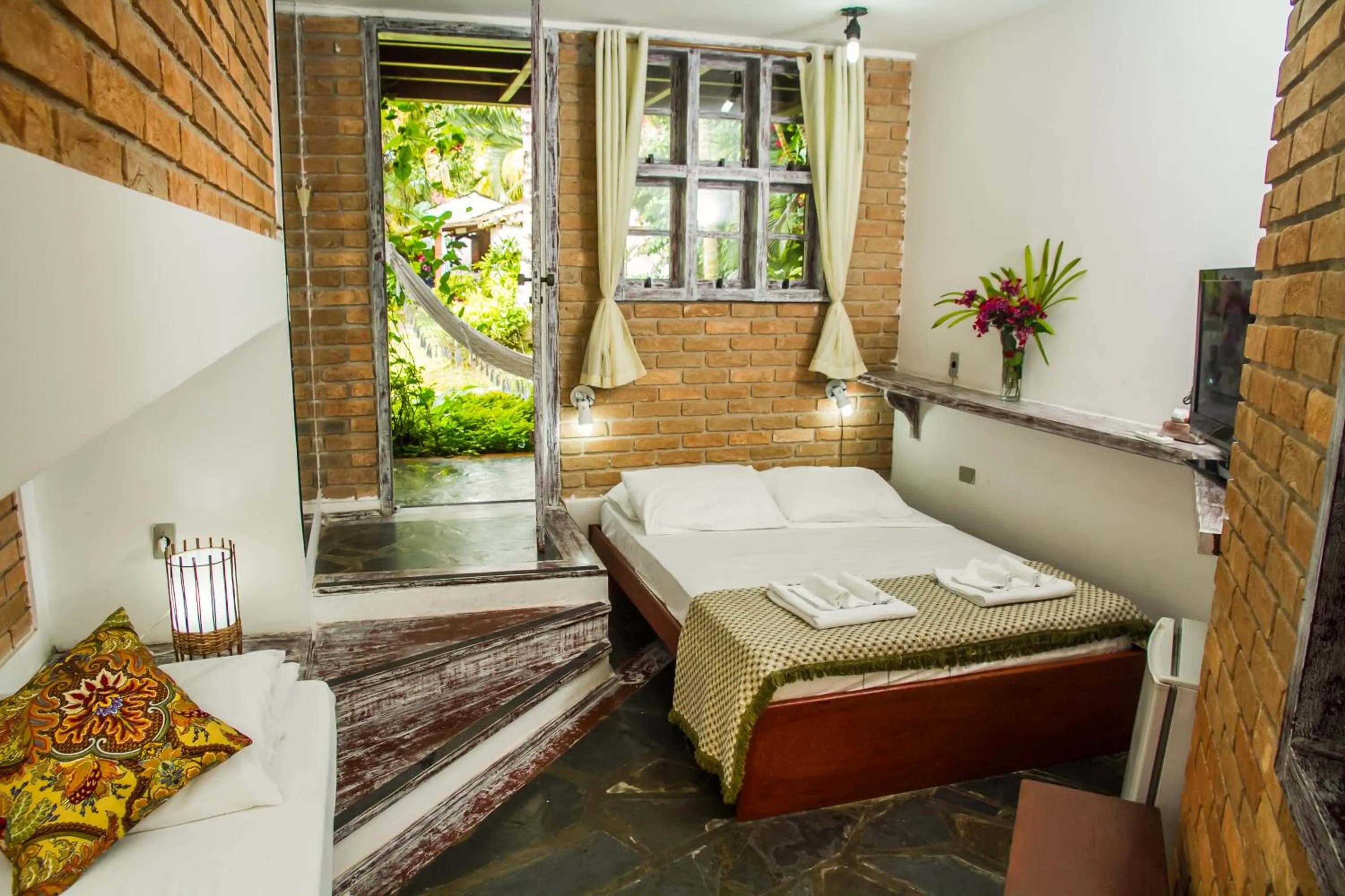 Photo of the whole room, Bed in Pousada Arraial Candeia