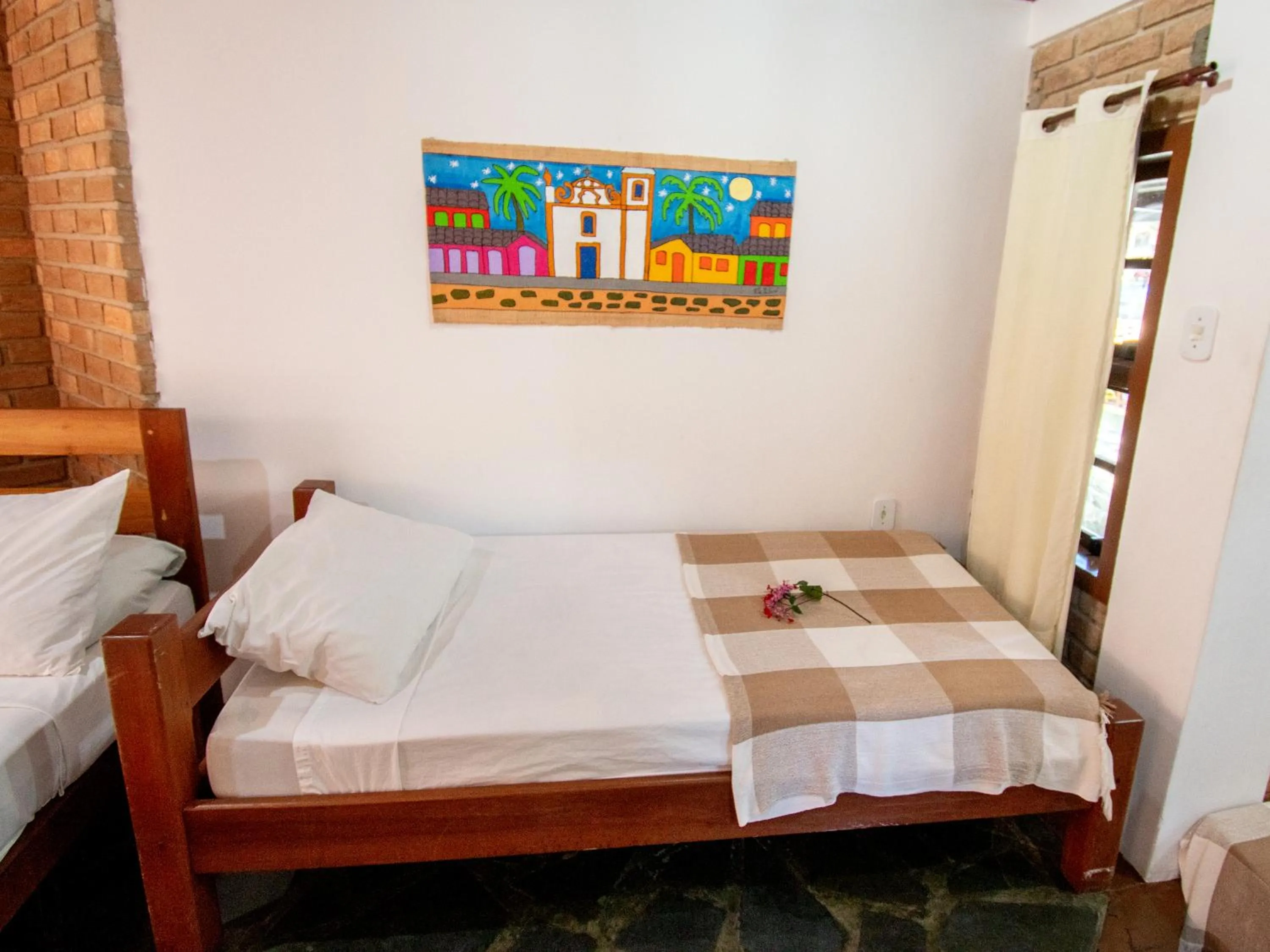 Bed in Pousada Arraial Candeia