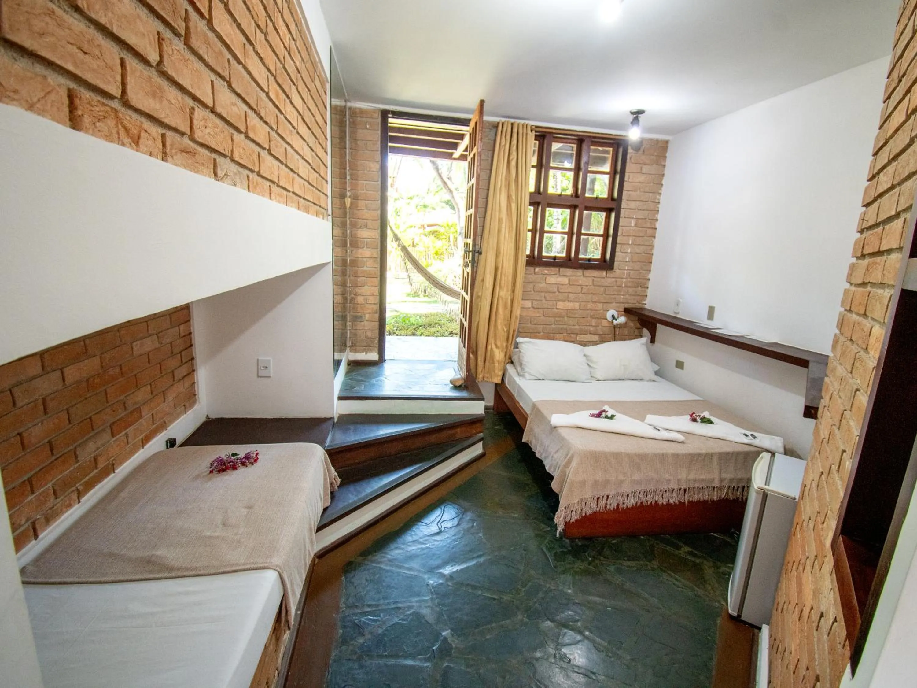 Bed in Pousada Arraial Candeia