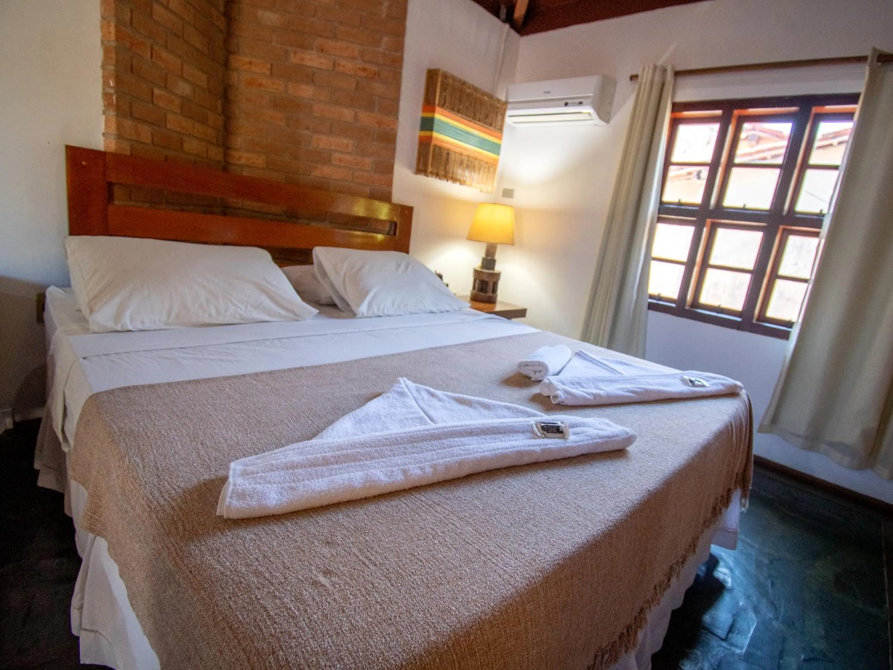 Bed in Pousada Arraial Candeia