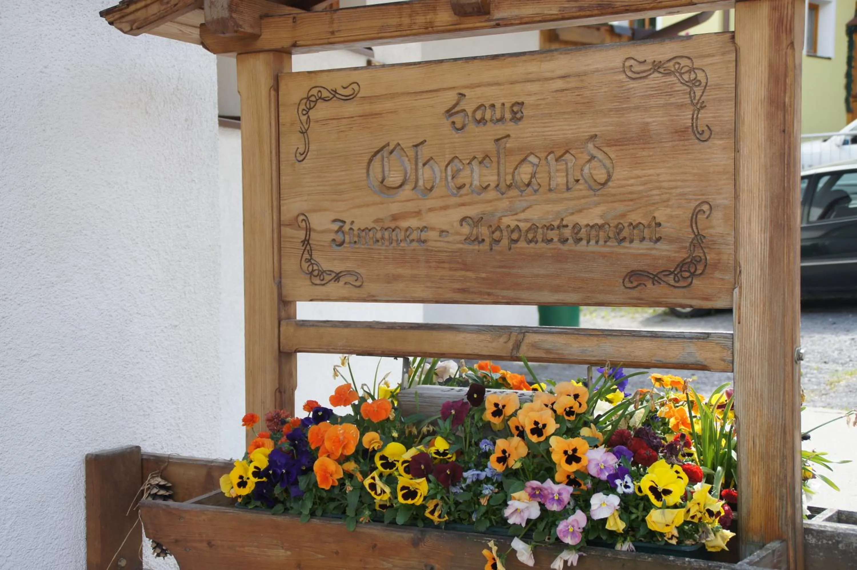 Property logo or sign in Haus Oberland