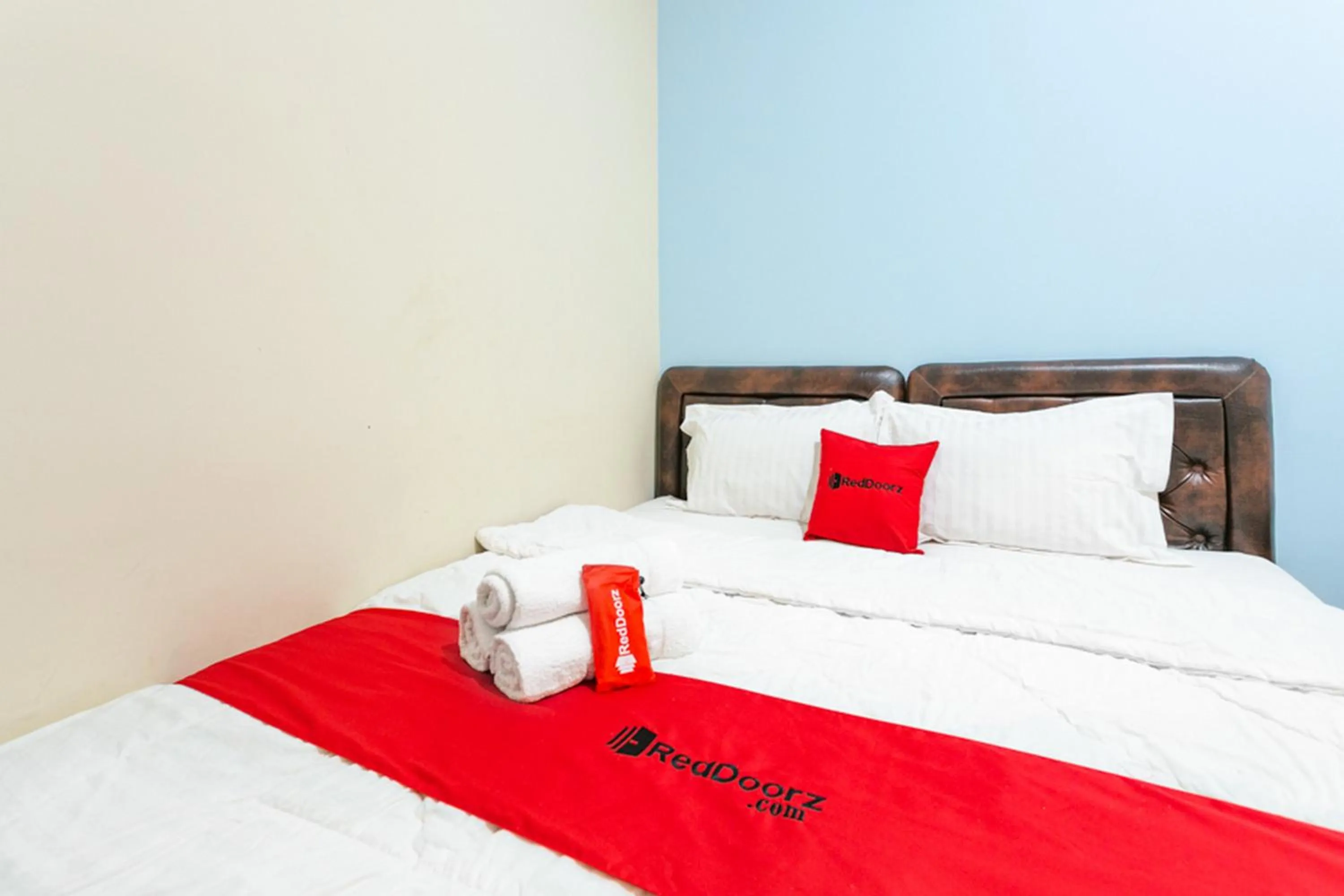 Bed in RedDoorz Syariah @ Sakinah Guesthouse