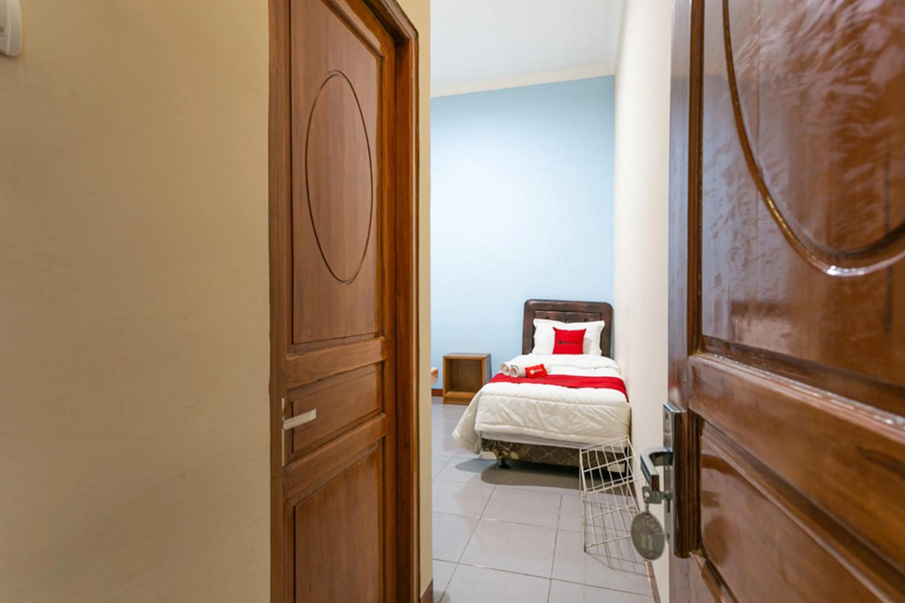 Bed in RedDoorz Syariah @ Sakinah Guesthouse