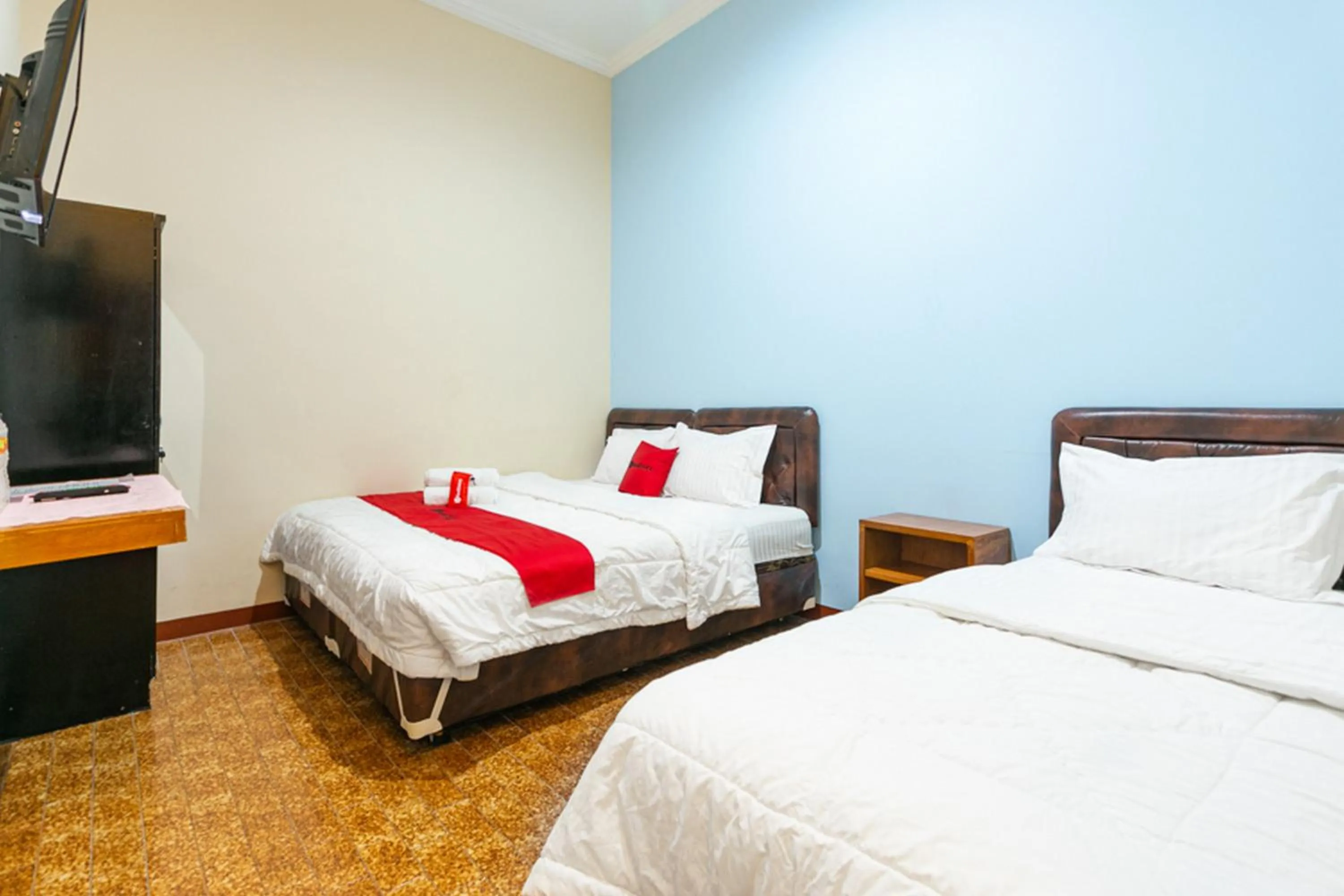 Bed in RedDoorz Syariah @ Sakinah Guesthouse