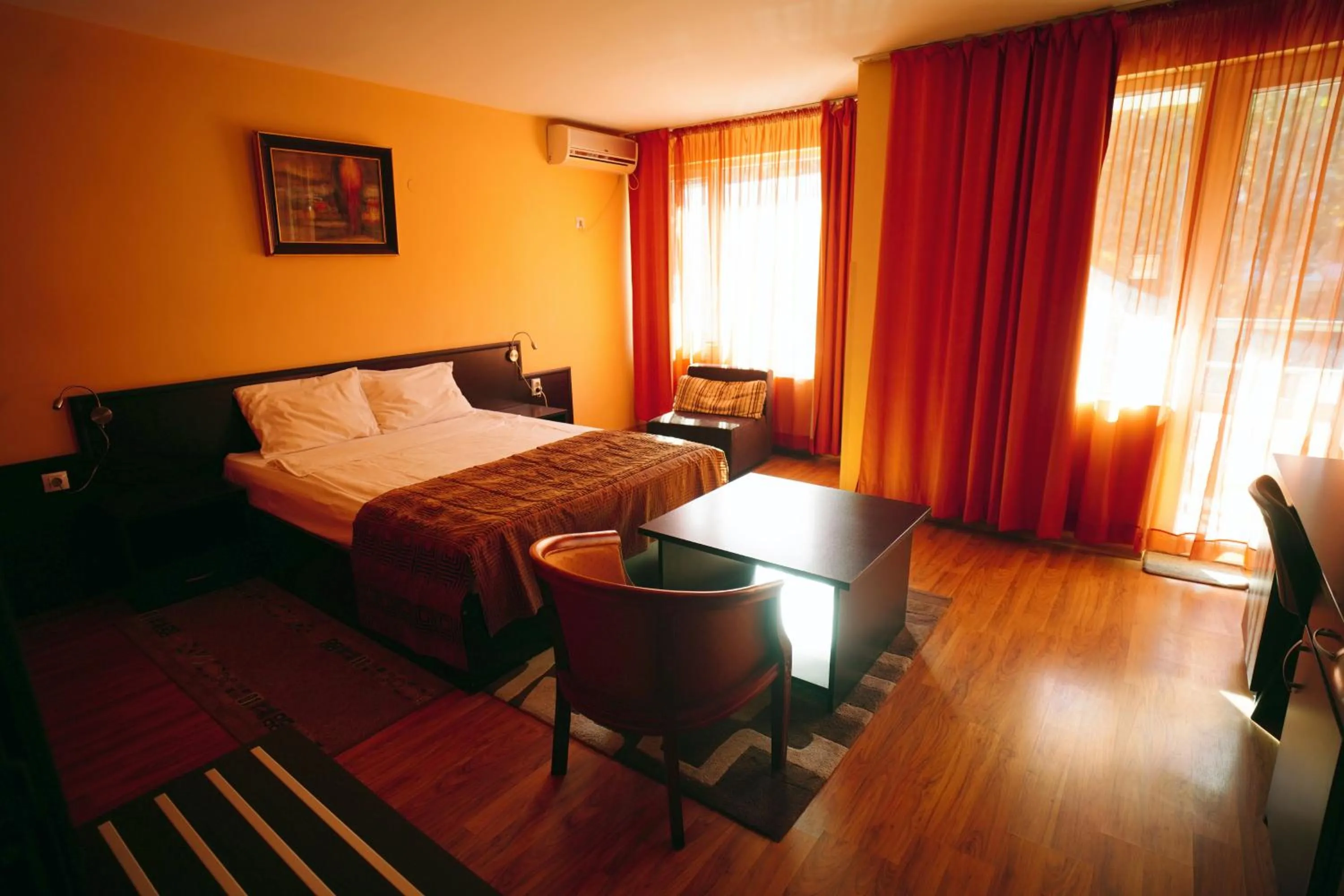 Bed in Family Art-Hotel Zora