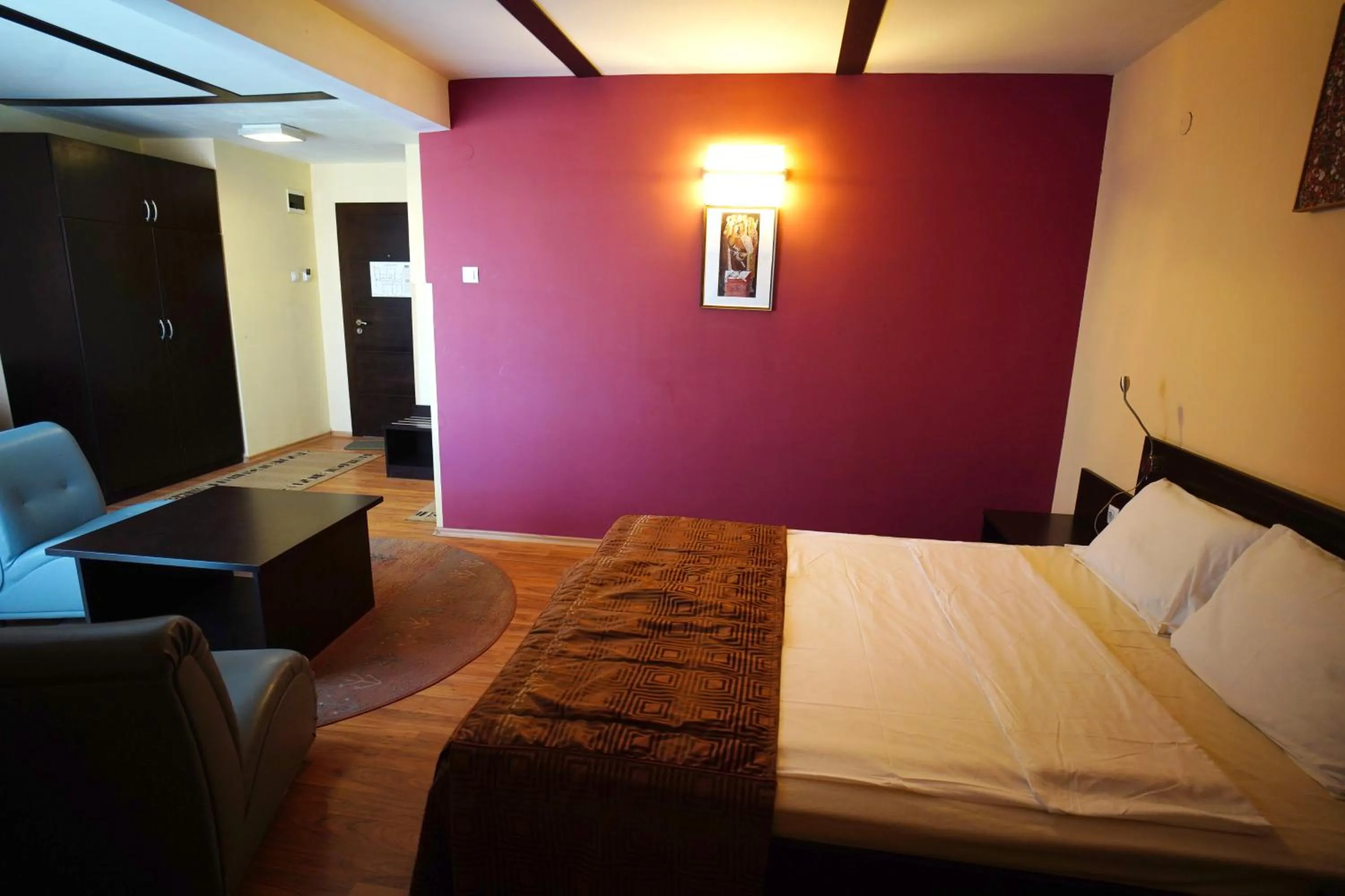 Bed in Family Art-Hotel Zora