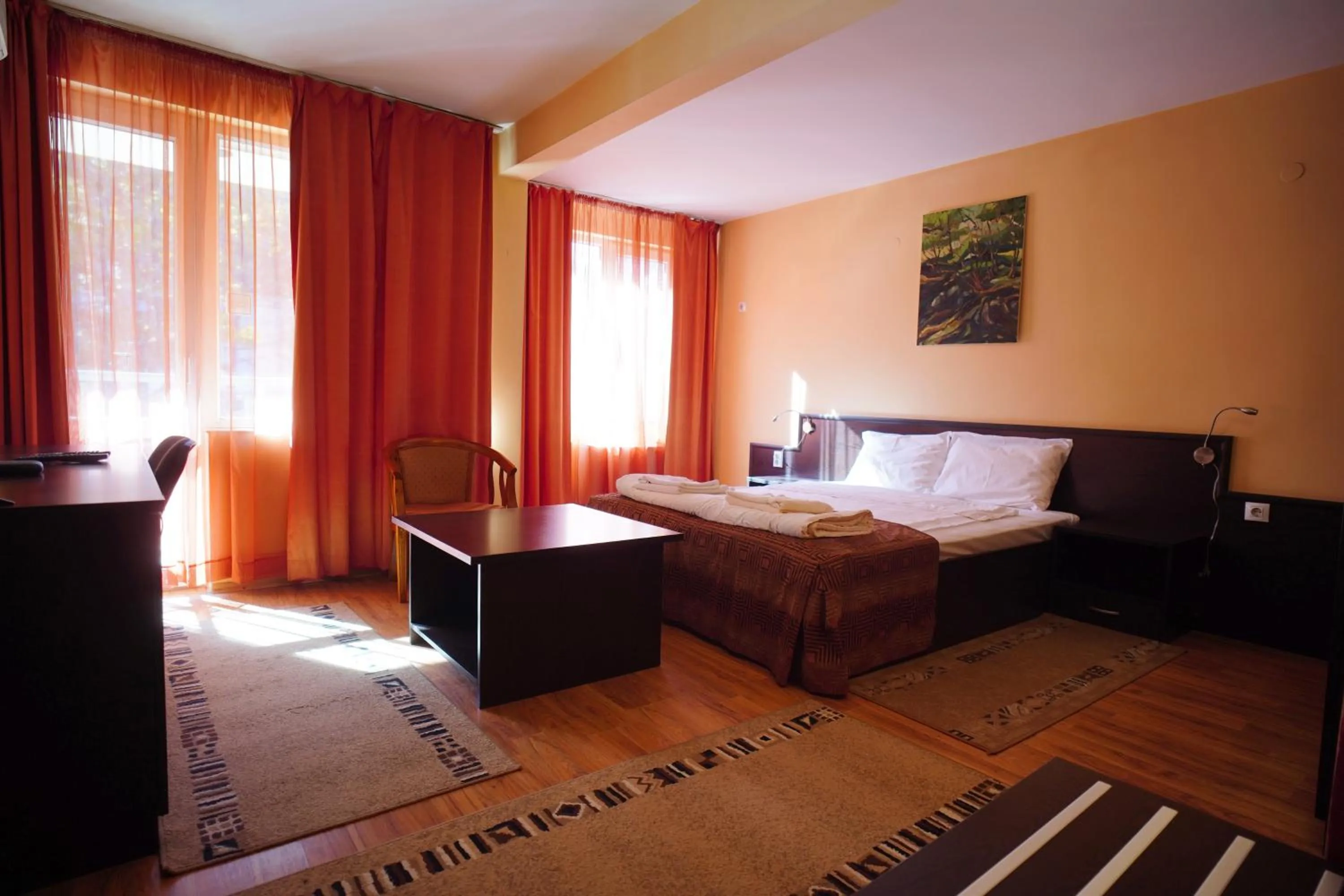 Bed in Family Art-Hotel Zora