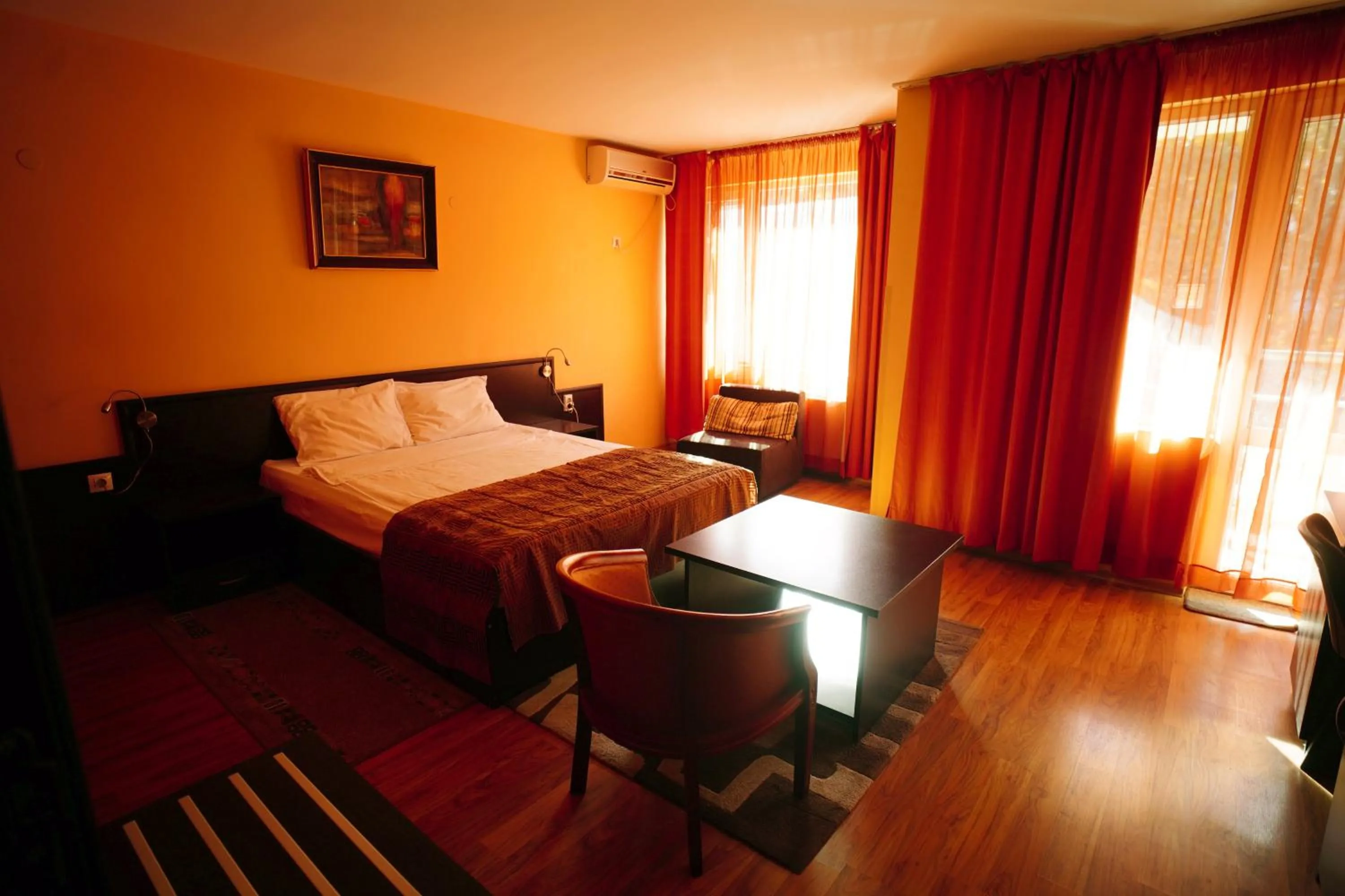 Bed in Family Art-Hotel Zora