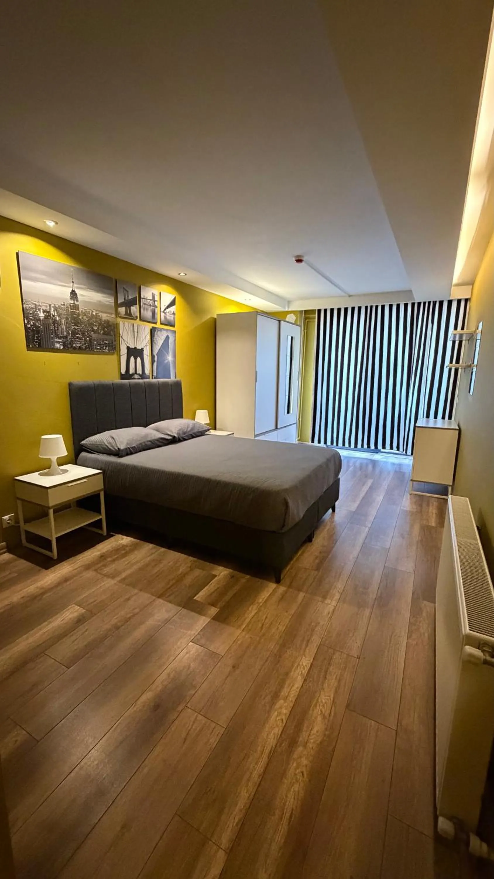 Bed in Deluxe Beach Residence