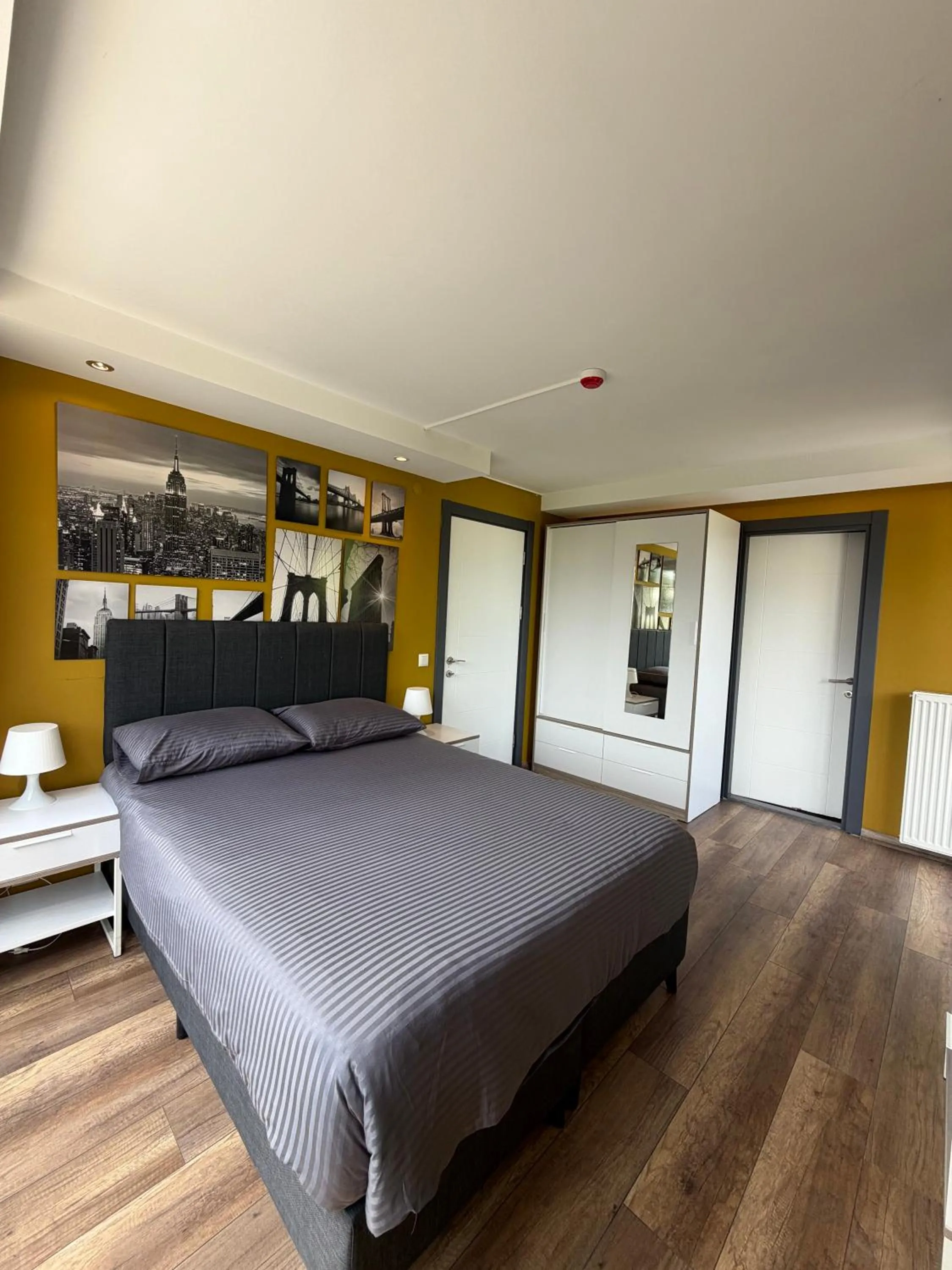 Bed in Deluxe Beach Residence