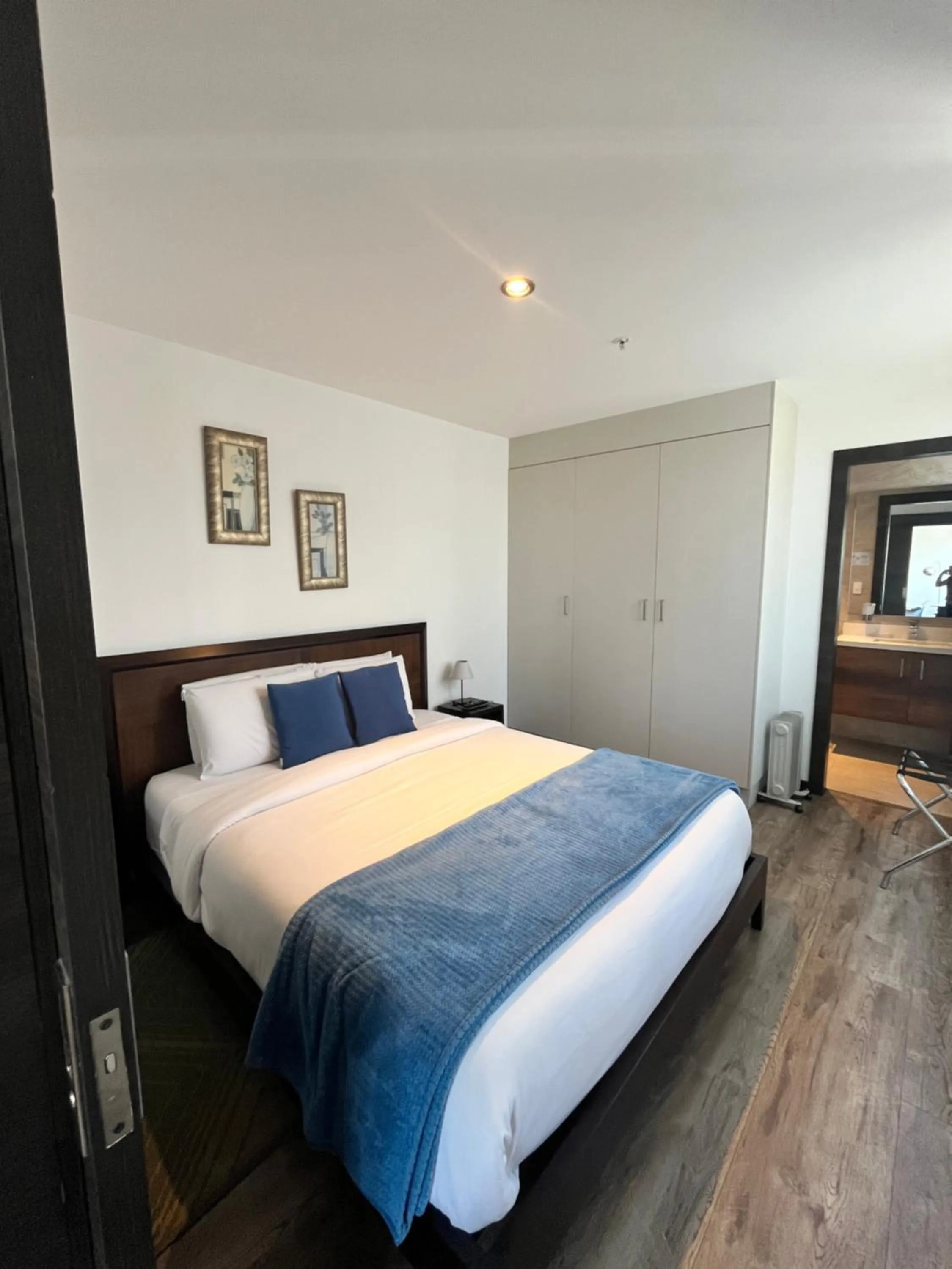 Bedroom, Bed in BlueZone Apartments