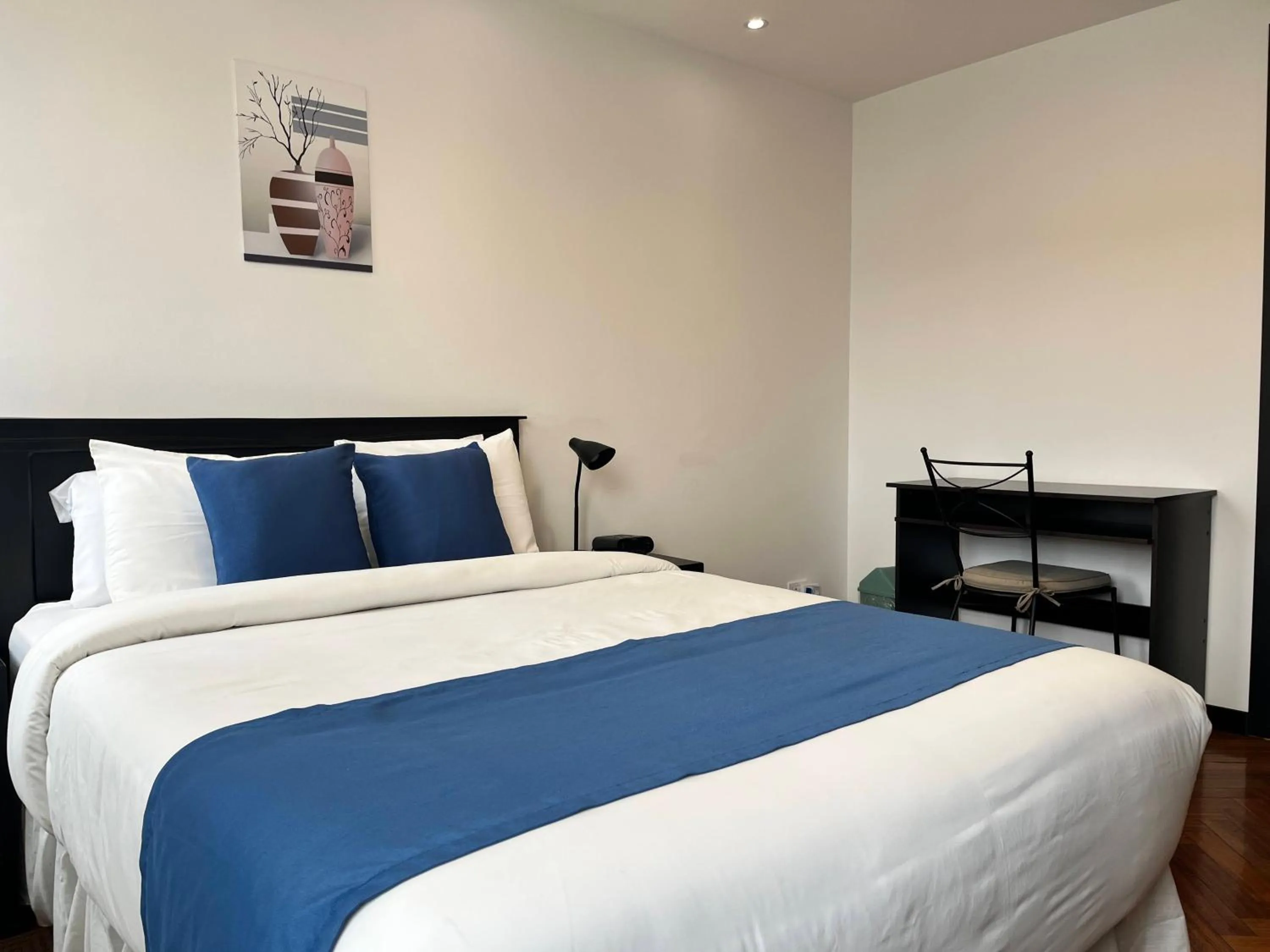 Bedroom, Bed in BlueZone Apartments