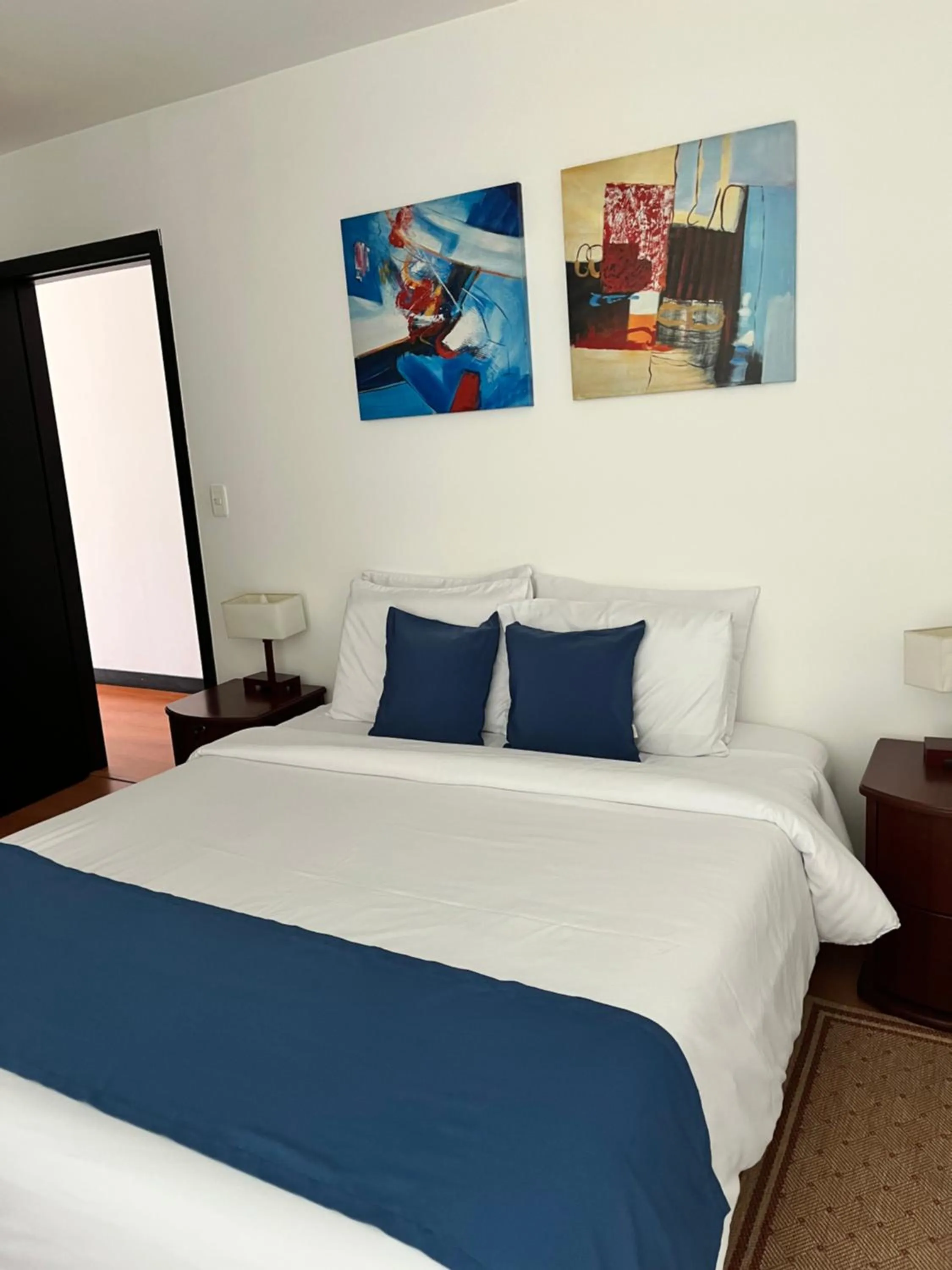 Bedroom, Bed in BlueZone Apartments