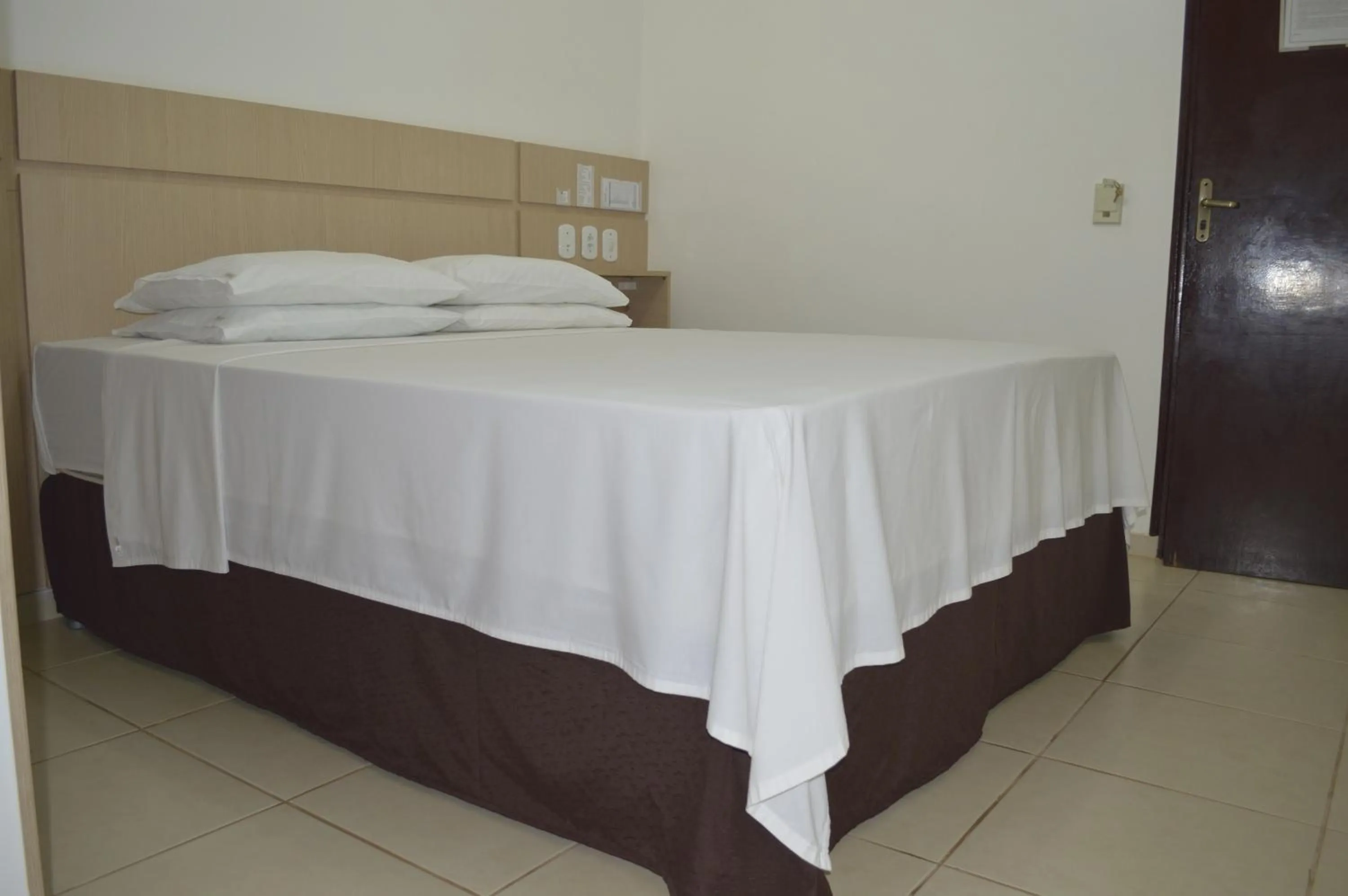 Bed in Richard Hotel