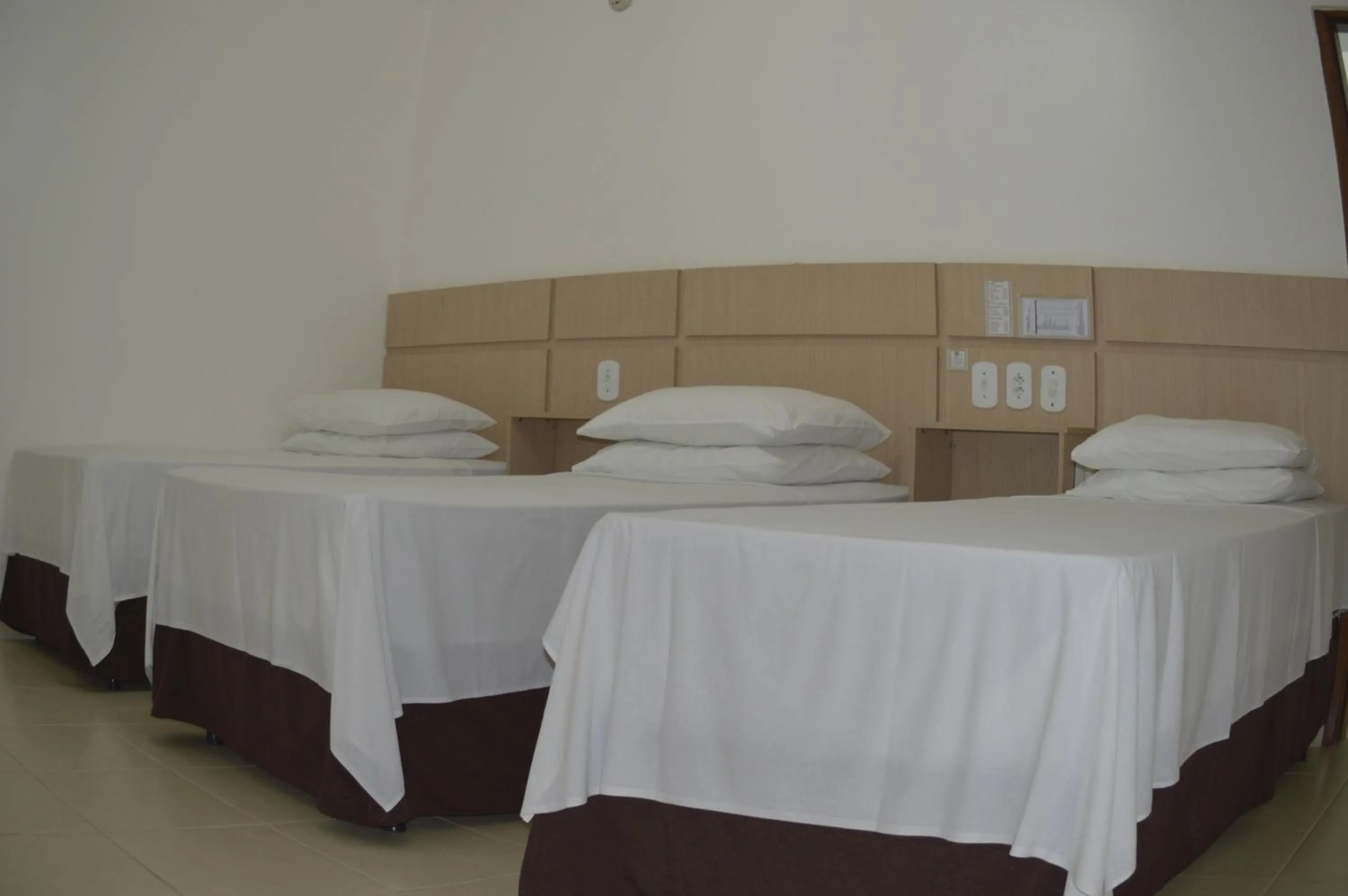 Bed in Richard Hotel