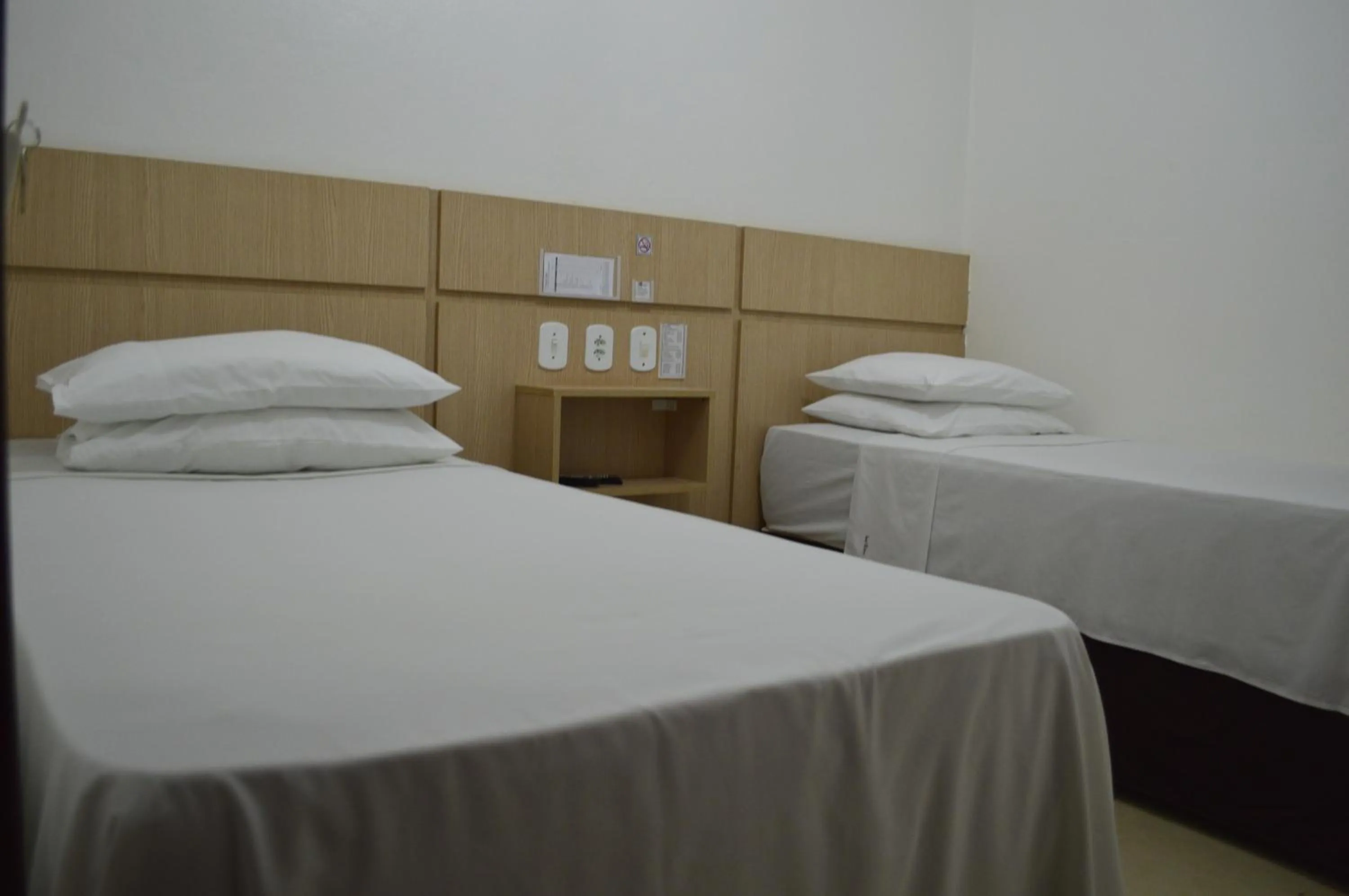 Bed in Richard Hotel