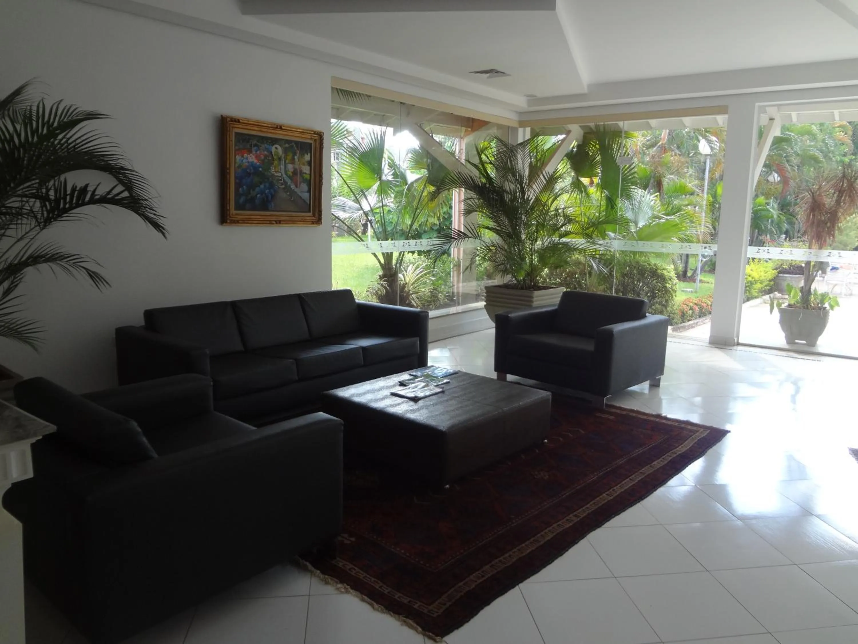 Seating area in Carlton Suítes Limeira