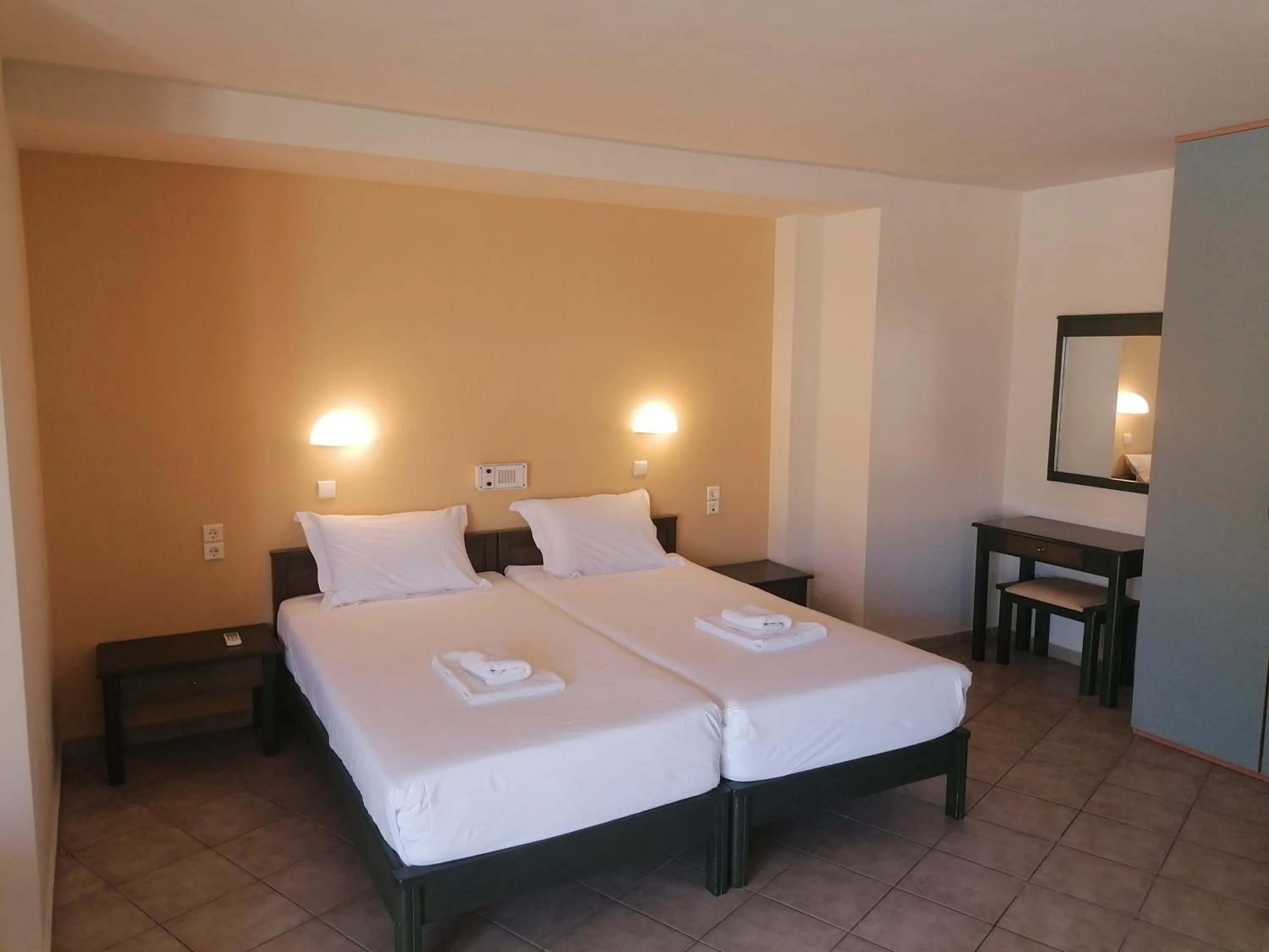 Bed in Villiana Holiday Apartments