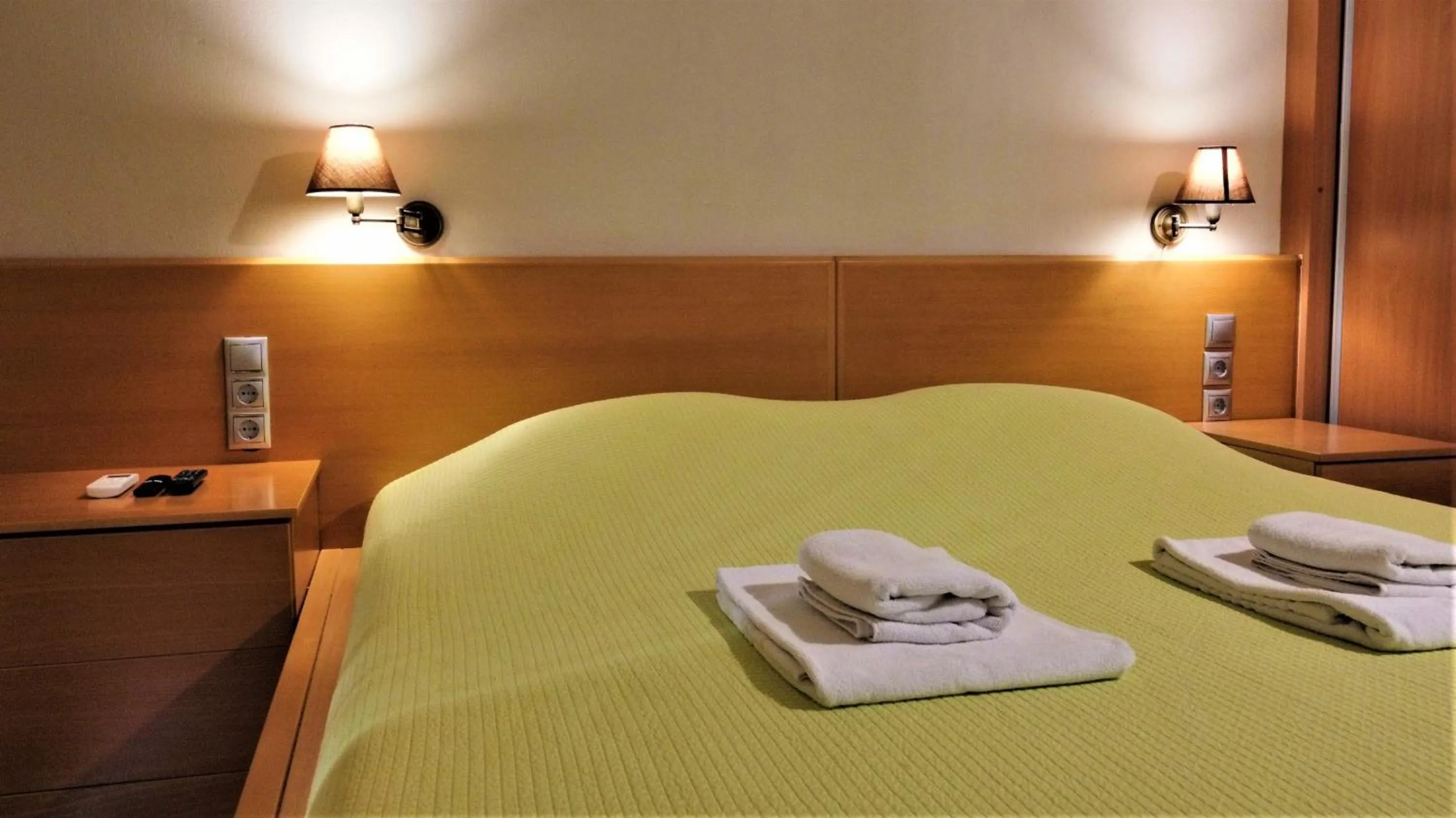 Bed in Villiana Holiday Apartments