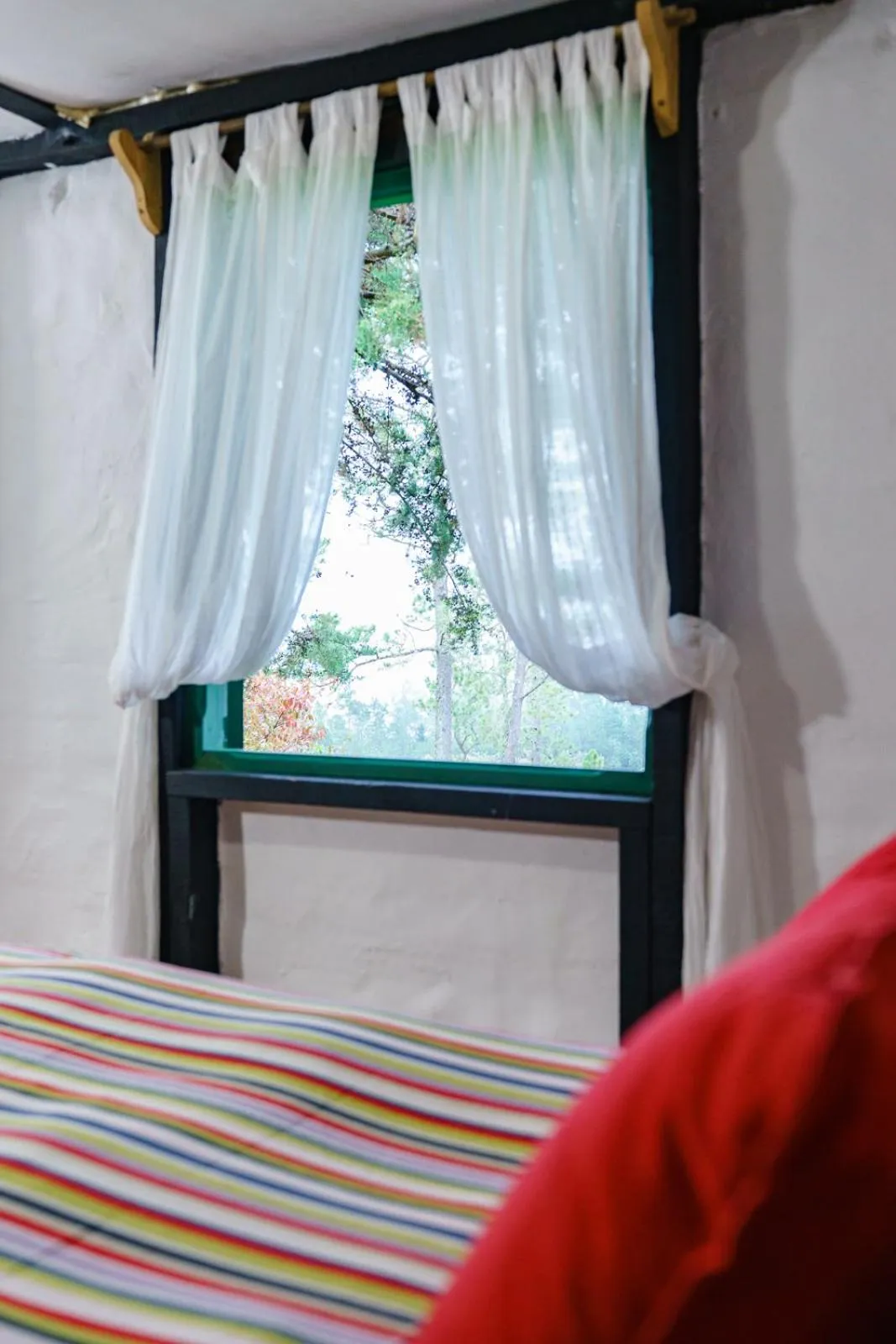 Bed in Villa Pajon Eco Lodge