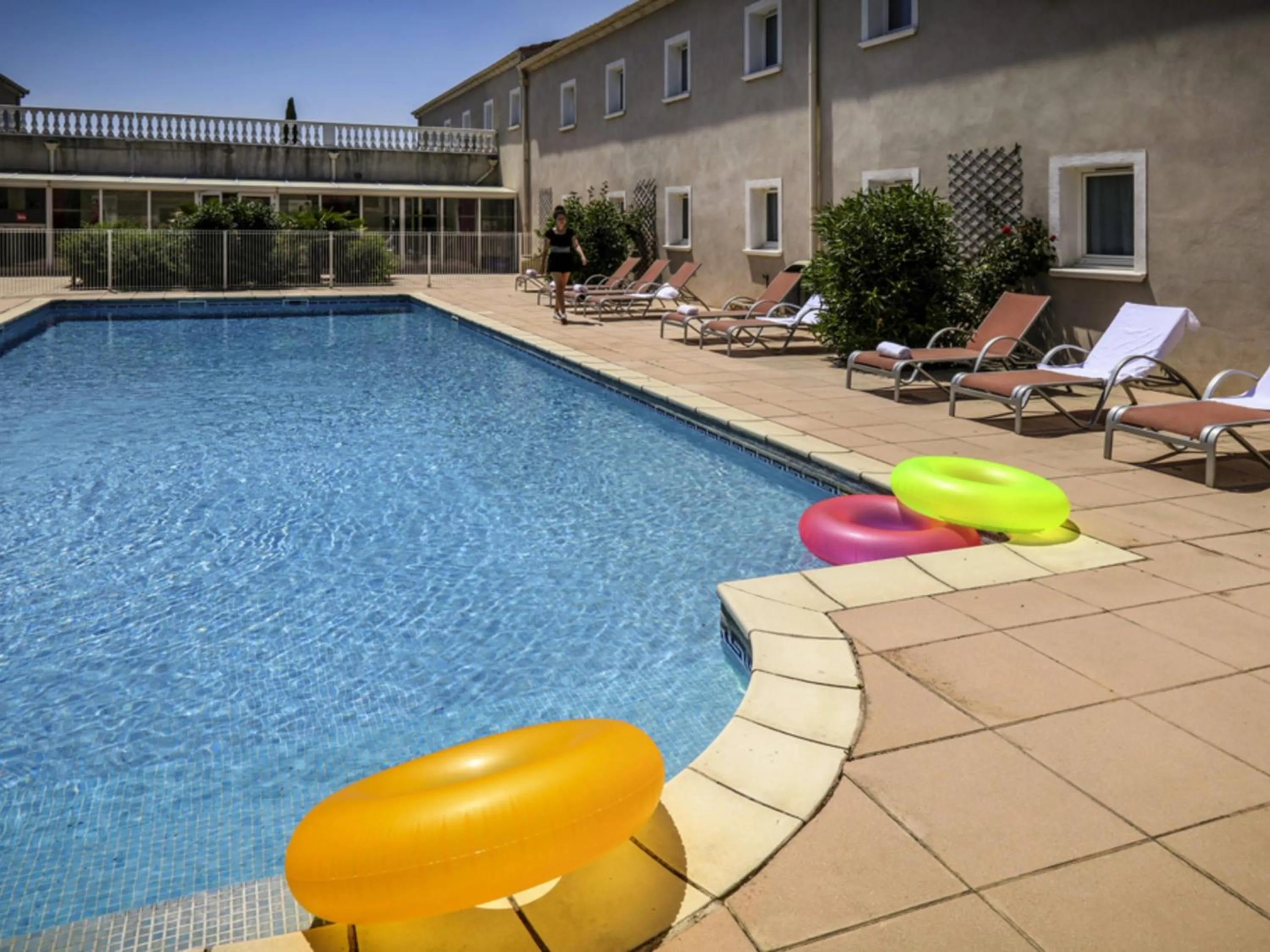 Pool view in ibis Orange Sud