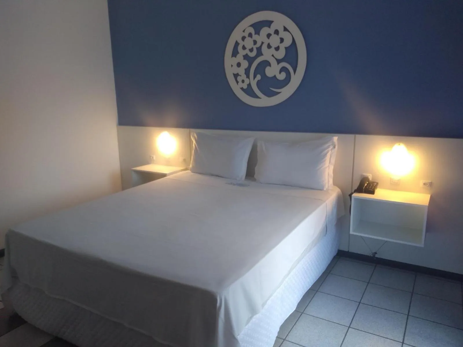 Photo of the whole room, Bed in Joaquina Beach Hotel