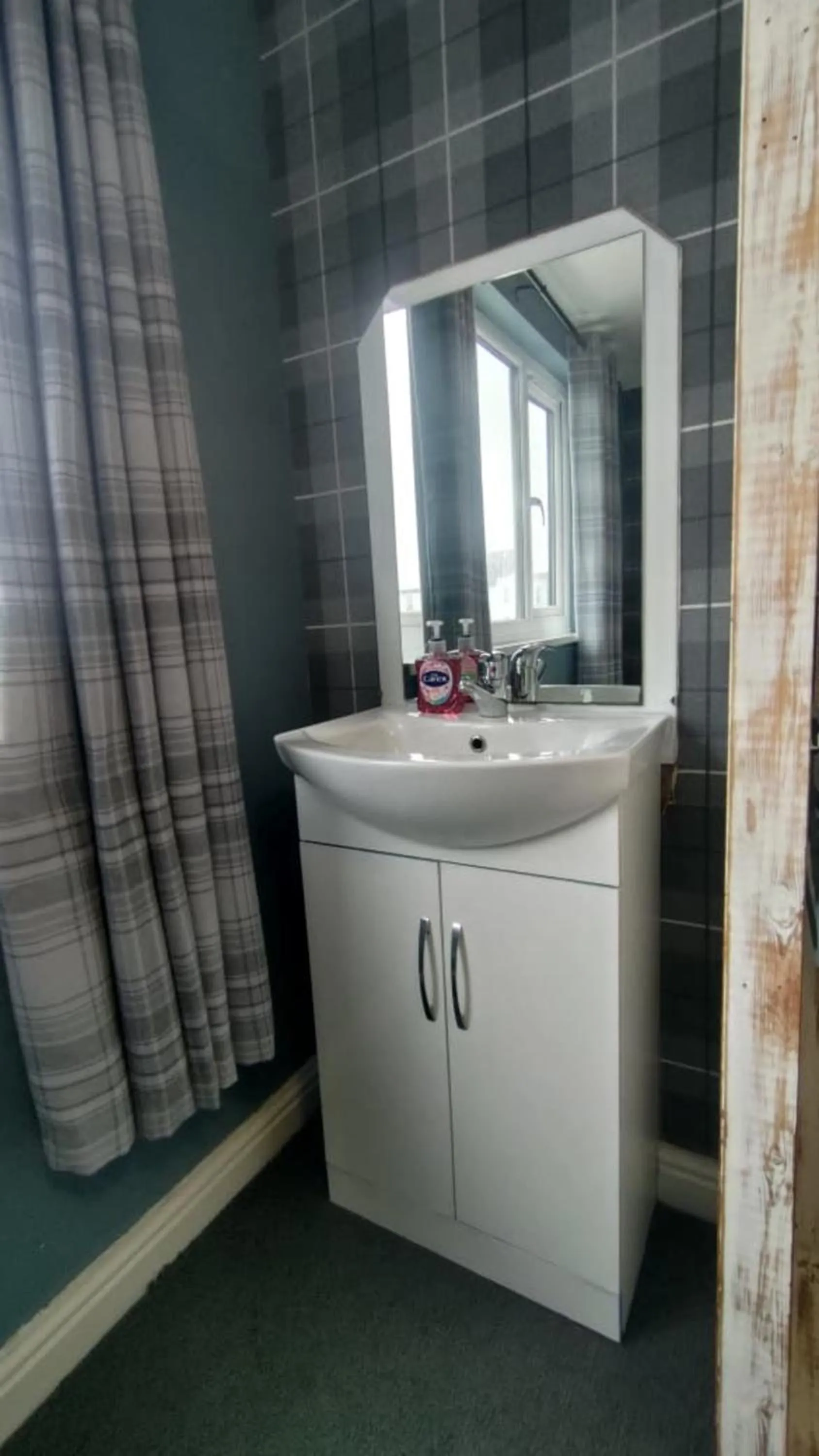 Bathroom in OYO Shore Surf Lodge