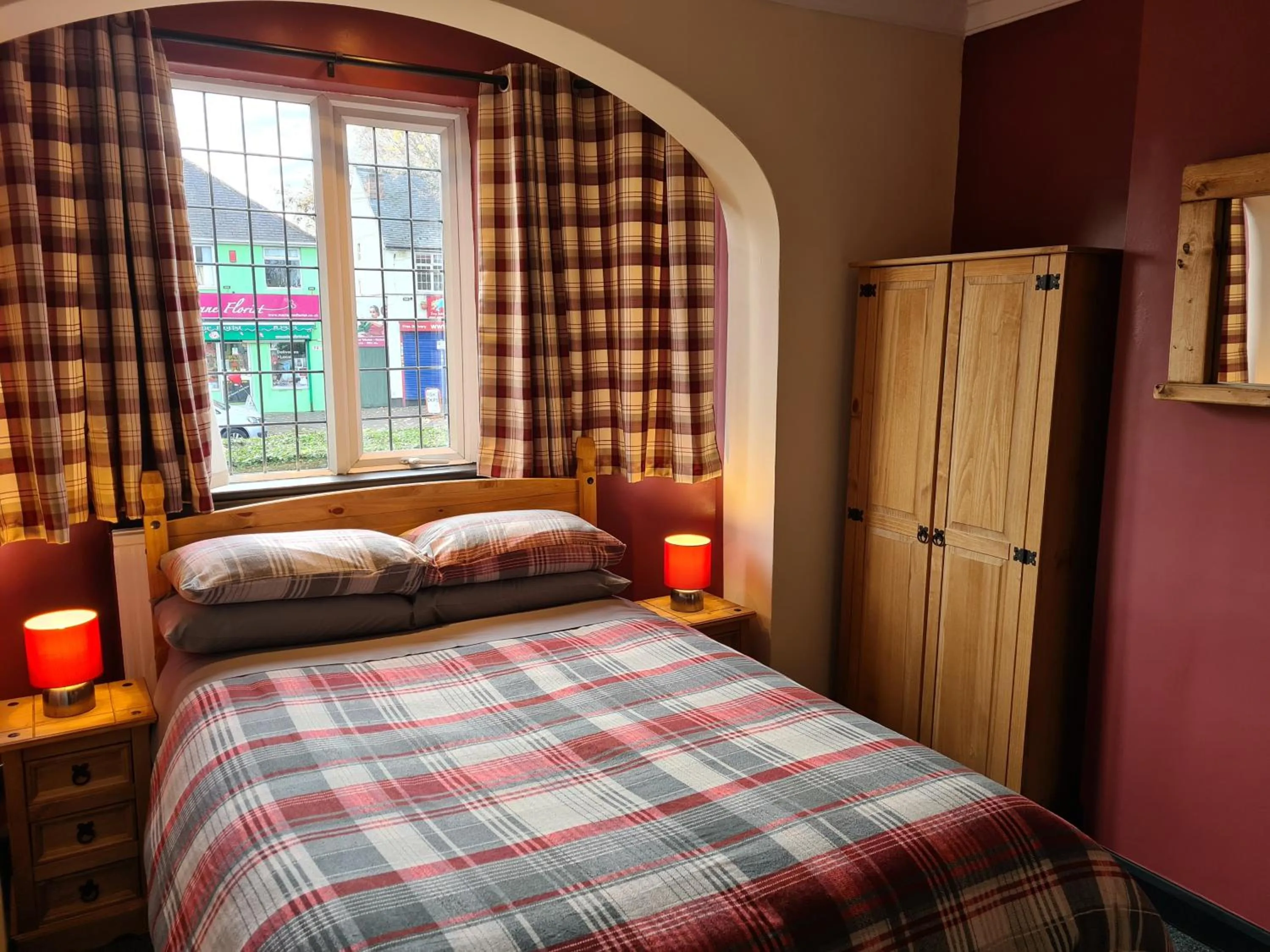 Bed in Tudor Lodge Hotel