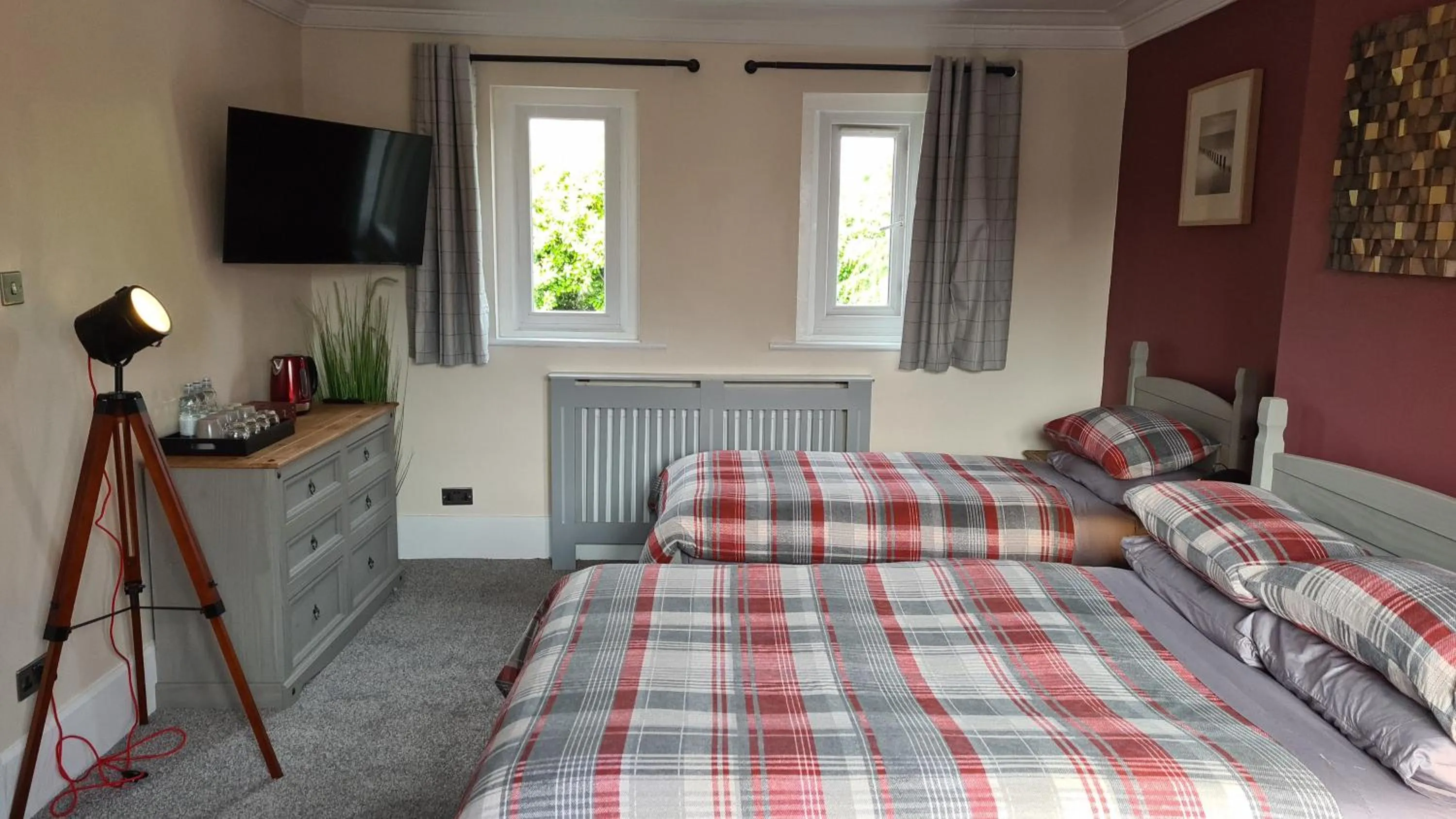 Bed in Tudor Lodge Hotel