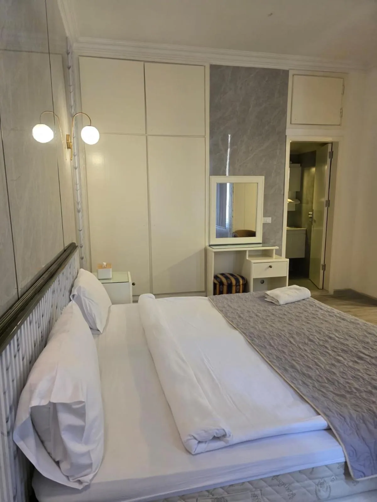 Bed in Elegant Suites Beirut