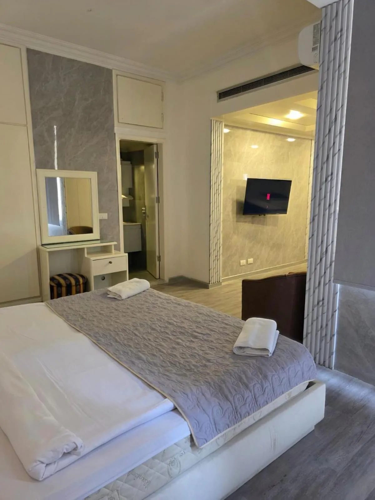 Bed in Elegant Suites Beirut