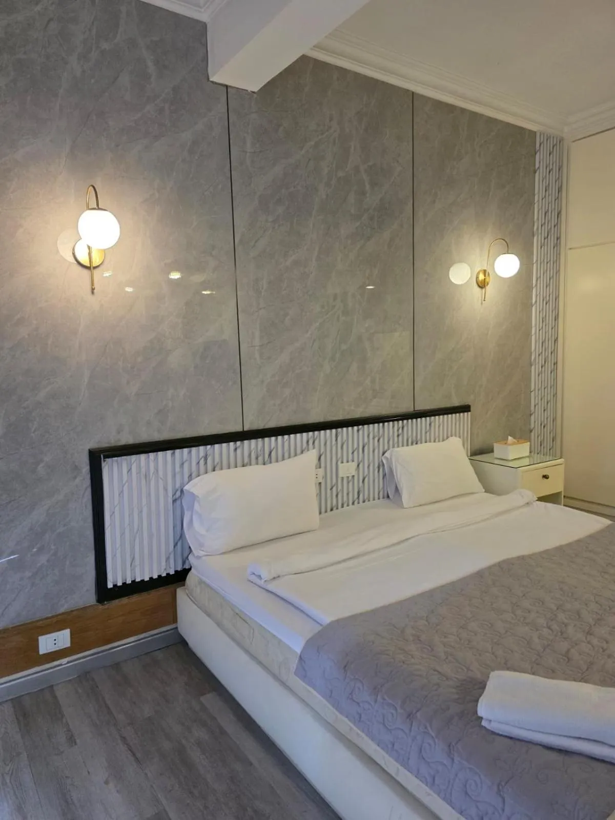 Bed in Elegant Suites Beirut