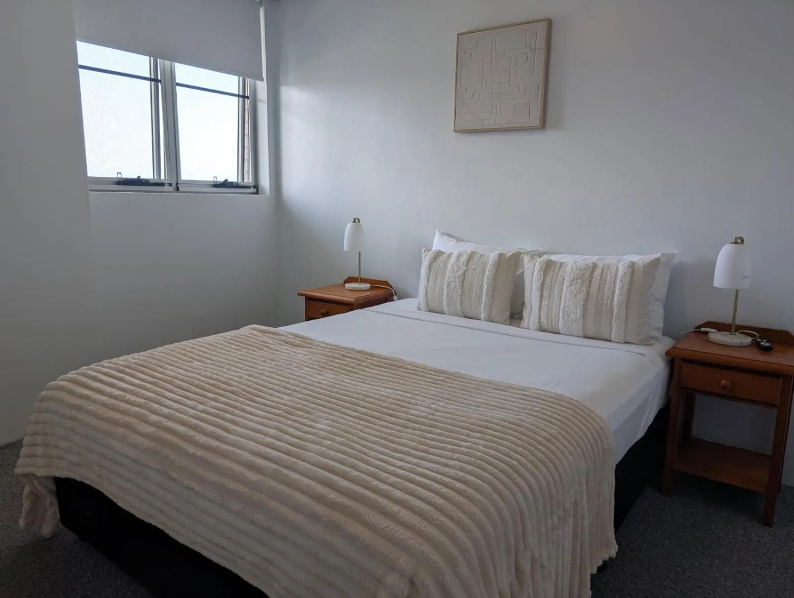 Bed in Tradewinds Apartments