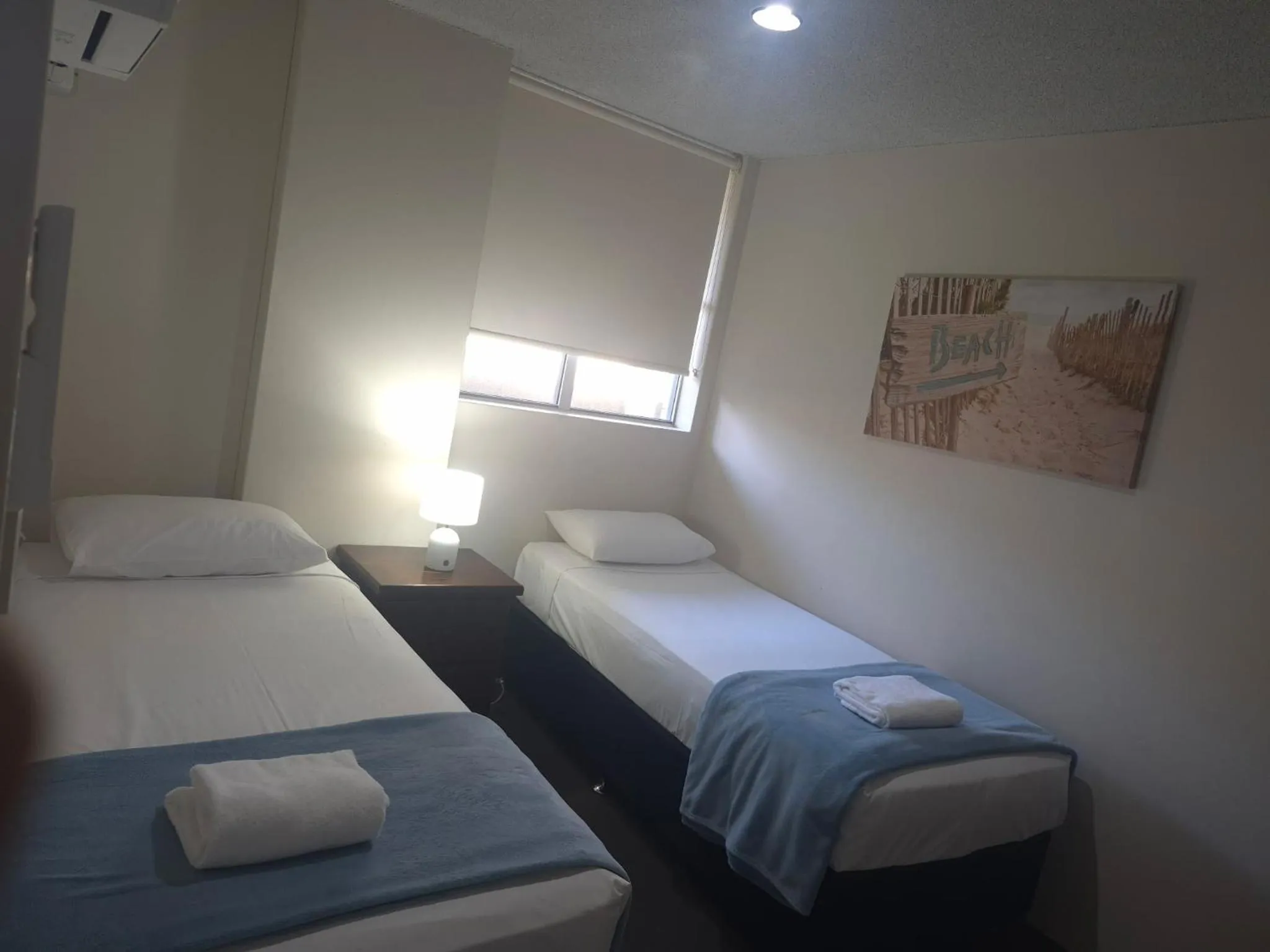 Bed in Tradewinds Apartments