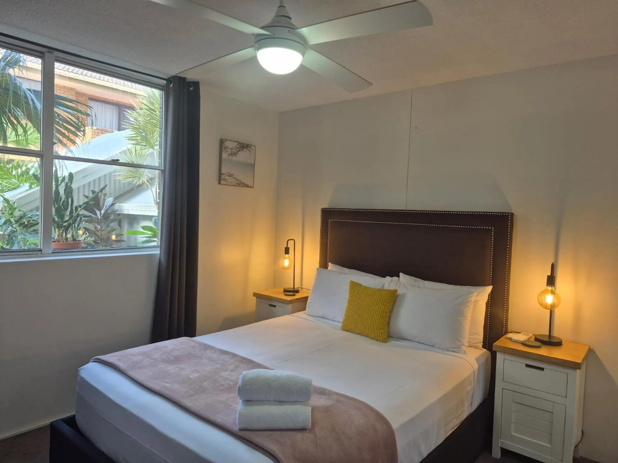 Bed in Tradewinds Apartments