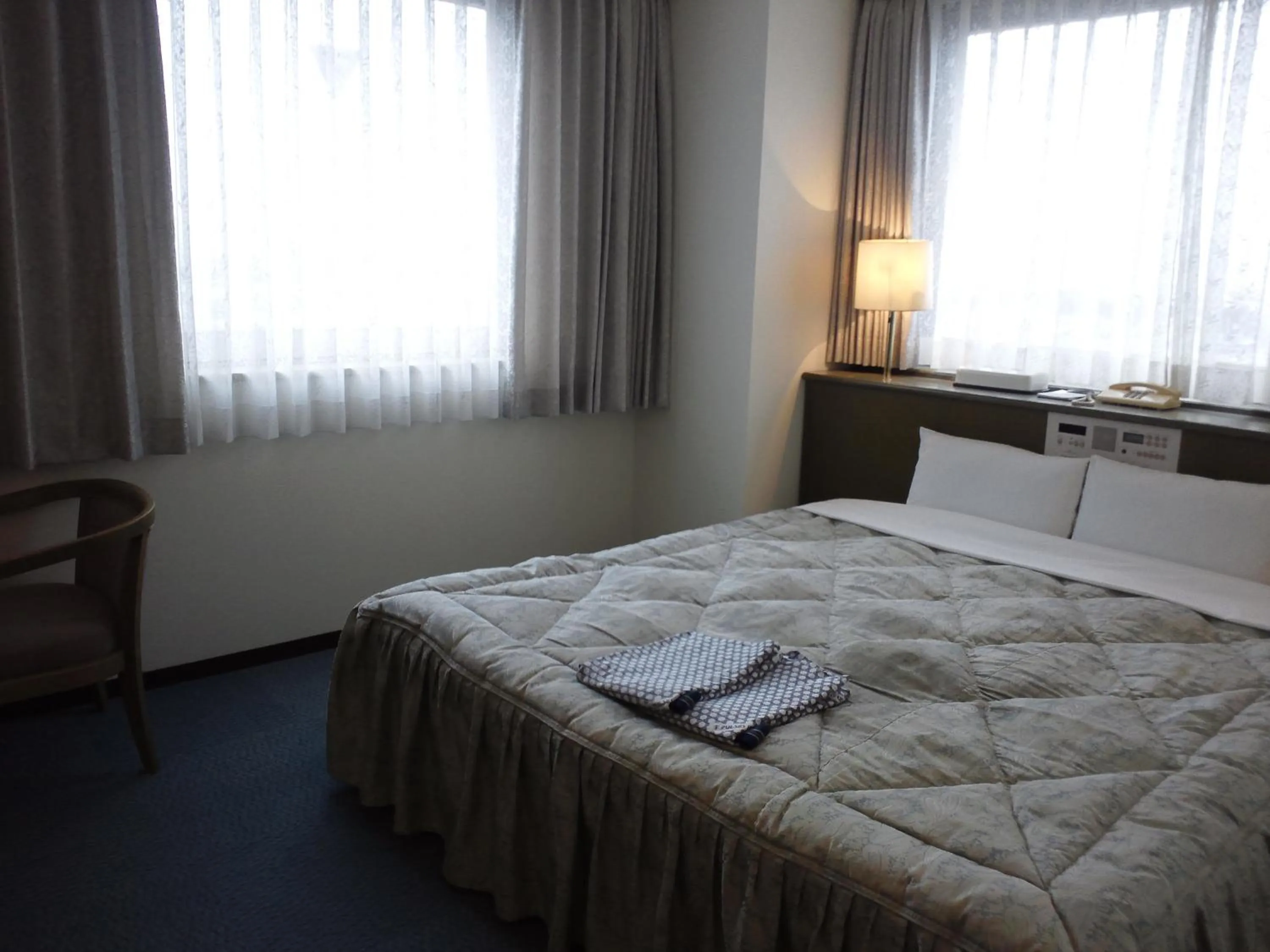 Bed in Pulses Inn Kyoto