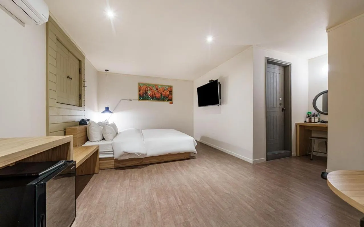 Bed in HOTEL YaJa WestGate